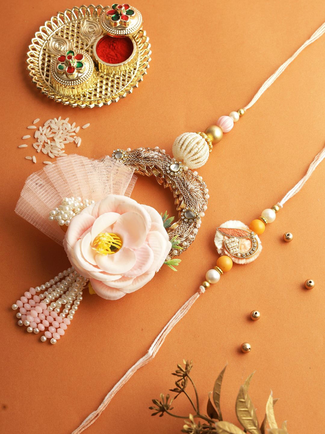 Aapno Rajasthan Set of 2 Floral Bhaiya Bhabhi Rakhi with Roli Chawal & Greeting Card, Pink
Aapno Rajasthan Set of 2 Floral Bhaiya Bhabhi Rakhi with Roli Chawal & Greeting Card, Pink