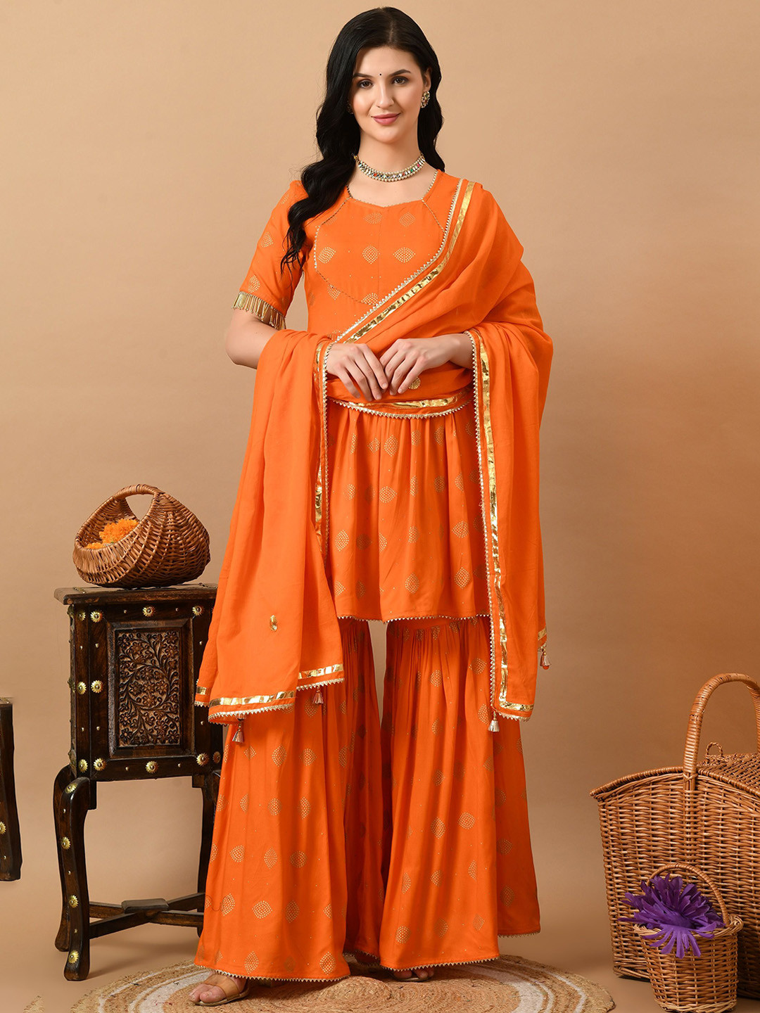 ETISHA Ethnic Motifs Printed Embellished Zari Anarkali Kurta With Sharara & Dupatta, Orange
ETISHA Ethnic Motifs Printed Embellished Zari Anarkali Kurta With Sharara & Dupatta, Orange
