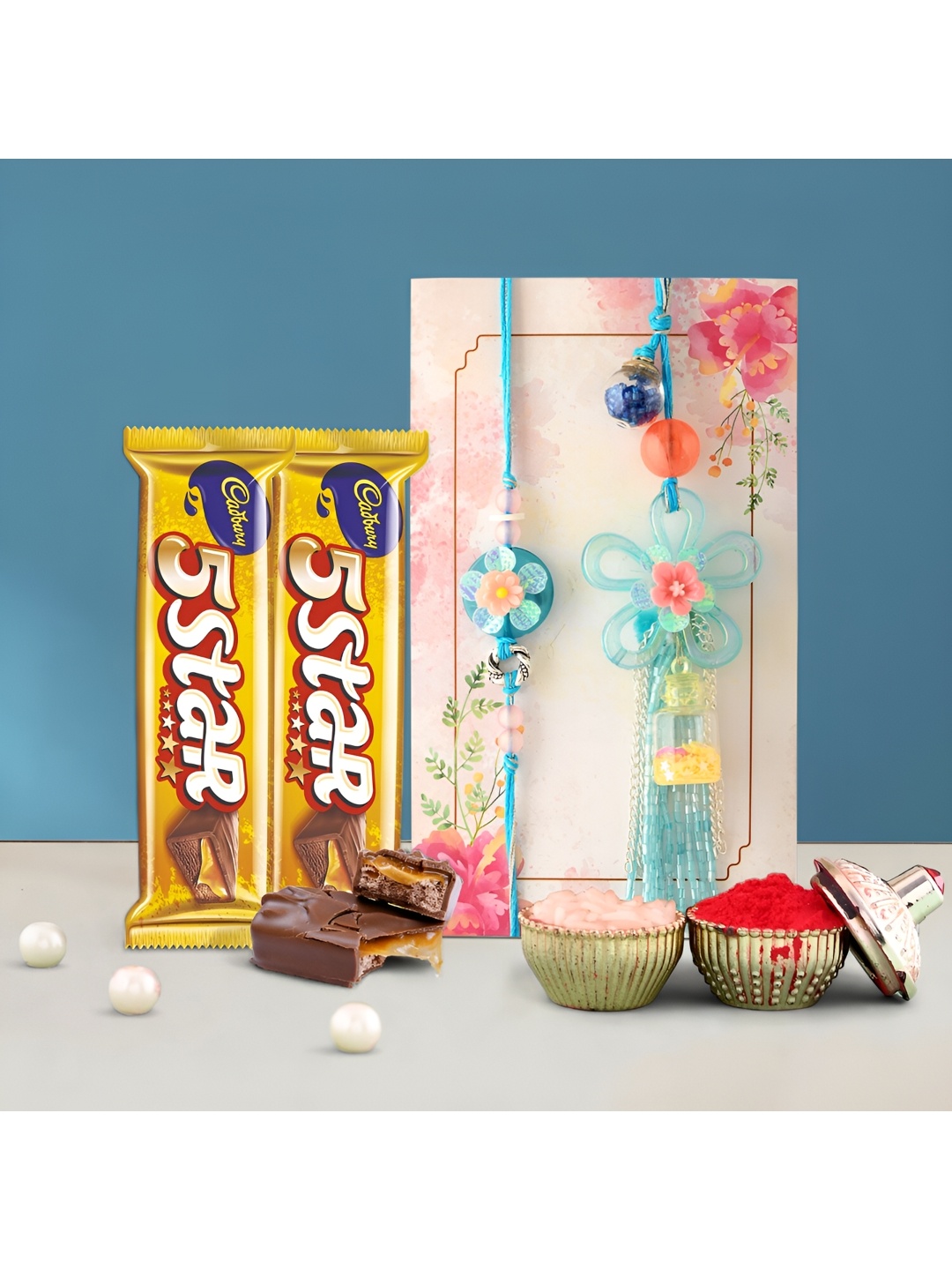 Ascension Set Of 2 Bhaiya Bhabhi Rakhis With Five Star Chocolates With Rholi Chawal, White
Ascension Set Of 2 Bhaiya Bhabhi Rakhis With Five Star Chocolates With Rholi Chawal, White