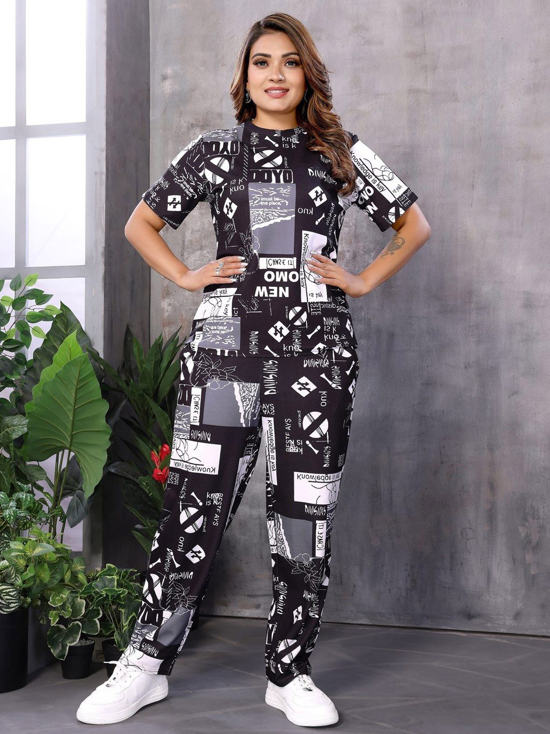 Titanium Silk Industries Printed Short Sleeve T-Shirt & Trousers Co-Ords, Black
Titanium Silk Industries Printed Short Sleeve T-Shirt & Trousers Co-Ords, Black