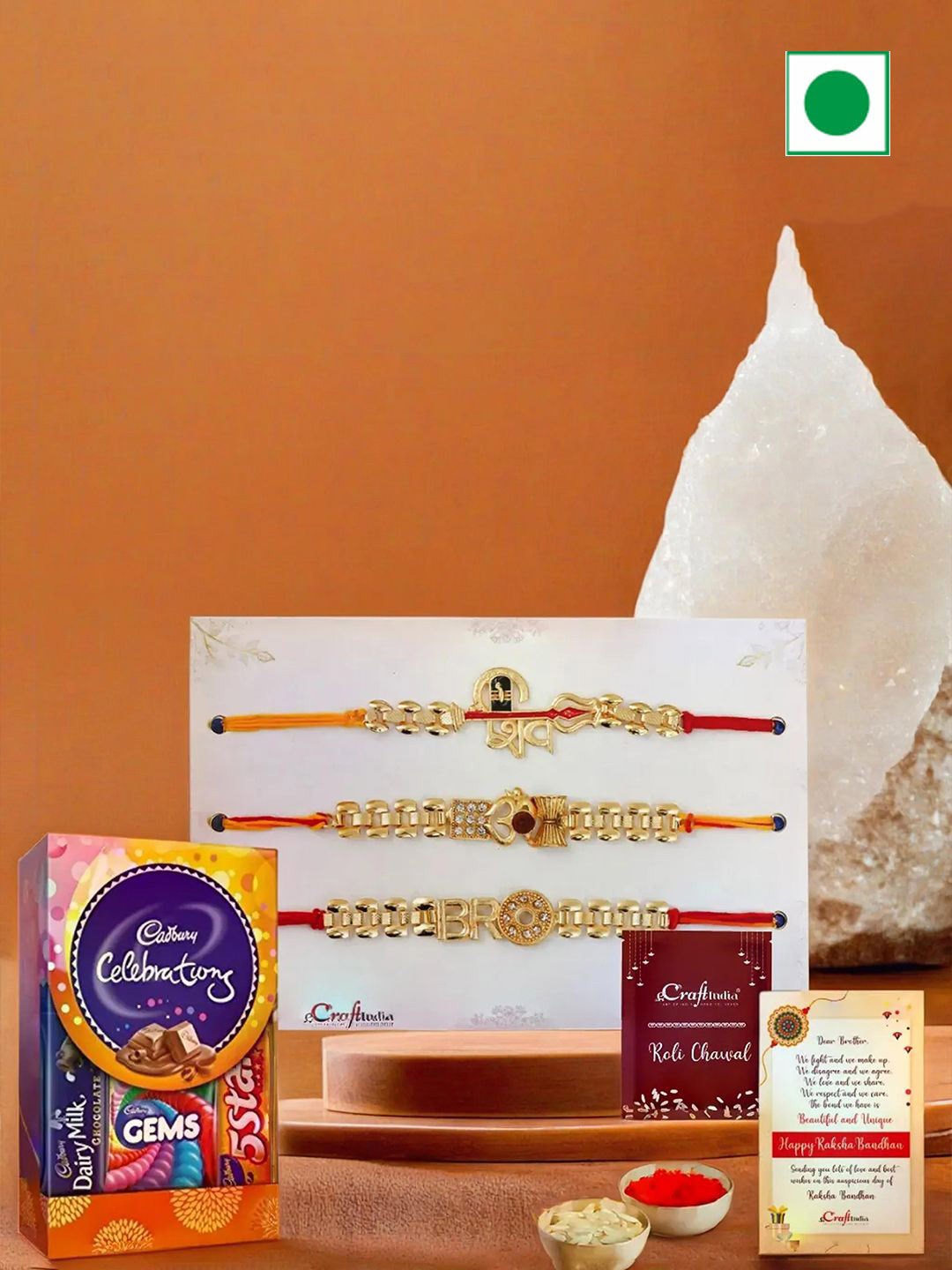 eCraftIndia Set of 3 Shiva Bro Om Rakhis With Cadbury Celebration Chocolate Gift Set, Red
eCraftIndia Set of 3 Shiva Bro Om Rakhis With Cadbury Celebration Chocolate Gift Set, Red