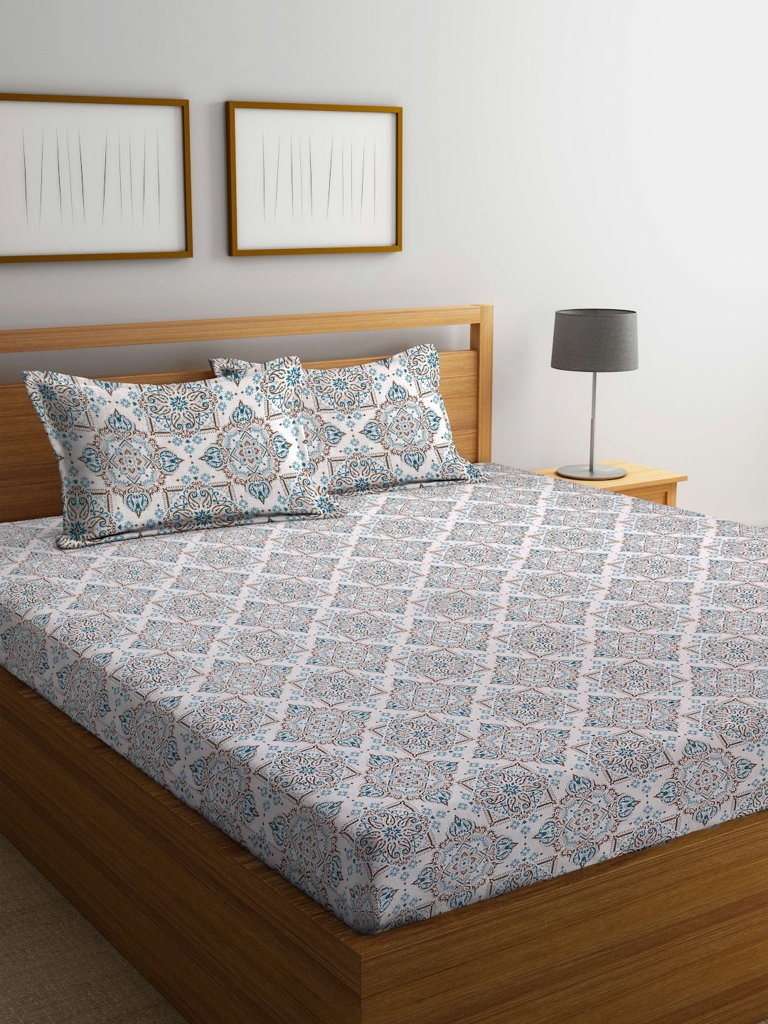 BOMBAY DYEING White & Blue Ethnic Motifs Cotton 144 TC Queen Bedsheet with 2 Pillow Covers
BOMBAY DYEING White & Blue Ethnic Motifs Cotton 144 TC Queen Bedsheet with 2 Pillow Covers
