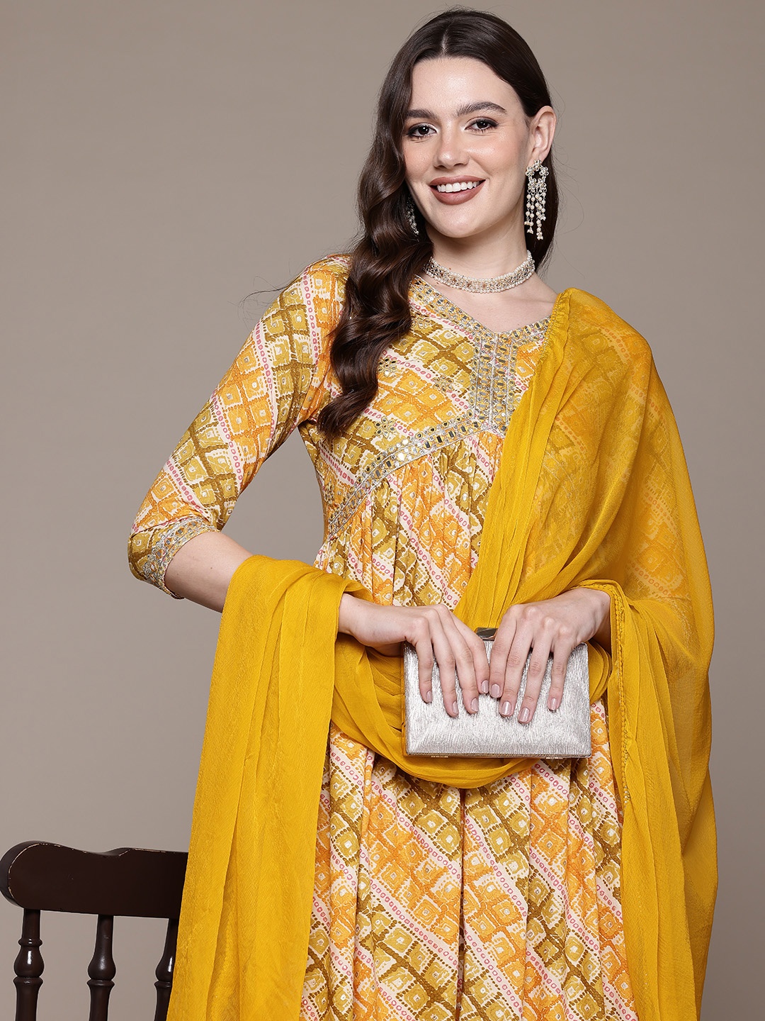 Readiprint Bandhani Printed Empire Mirror Work Kurta With Trousers & Dupatta, Mustard
Readiprint Bandhani Printed Empire Mirror Work Kurta With Trousers & Dupatta, Mustard