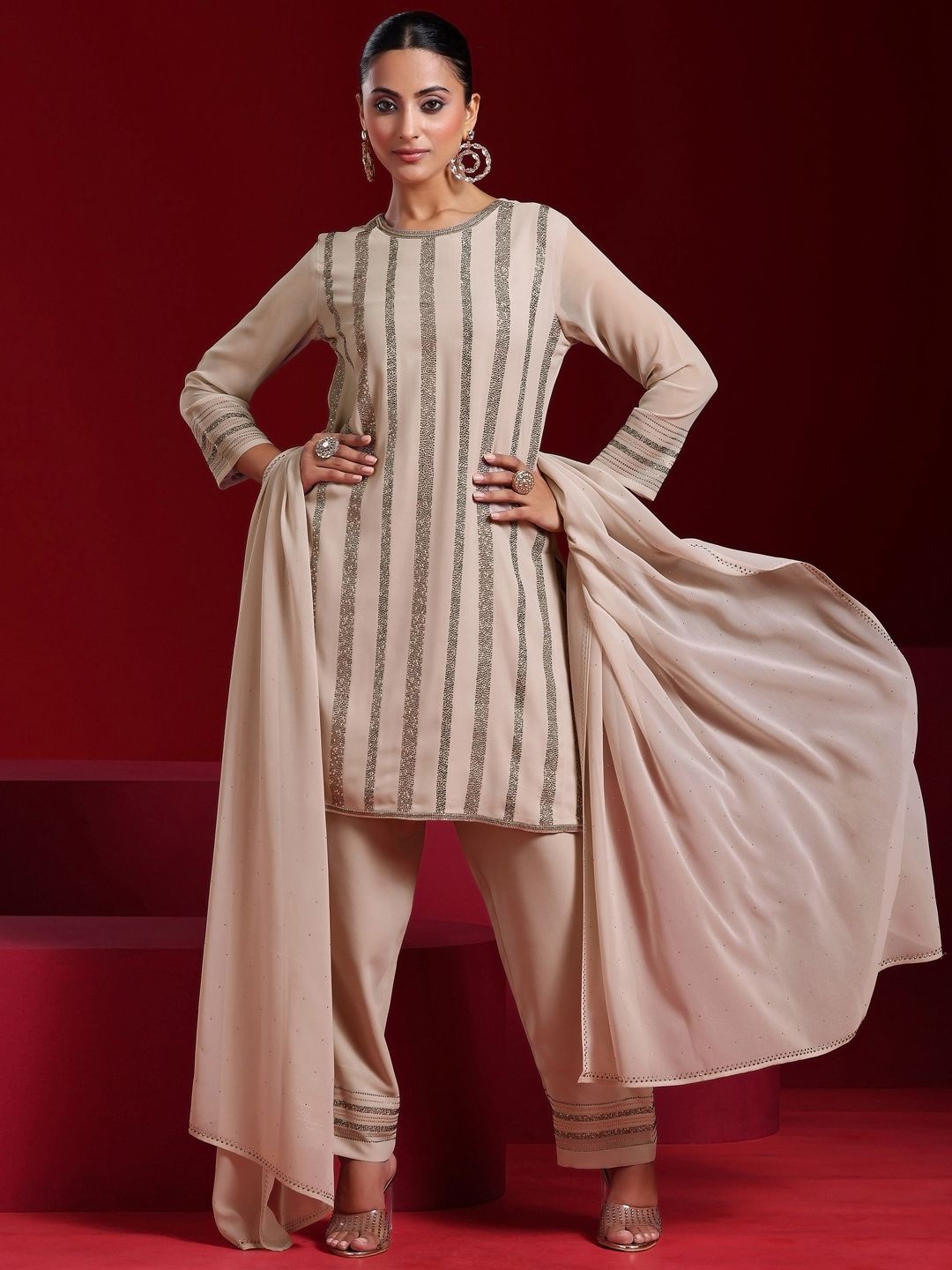 Libas Art Striped Regular Beads and Stones Kurta with Palazzos & With Dupatta, Taupe
Libas Art Striped Regular Beads and Stones Kurta with Palazzos & With Dupatta, Taupe