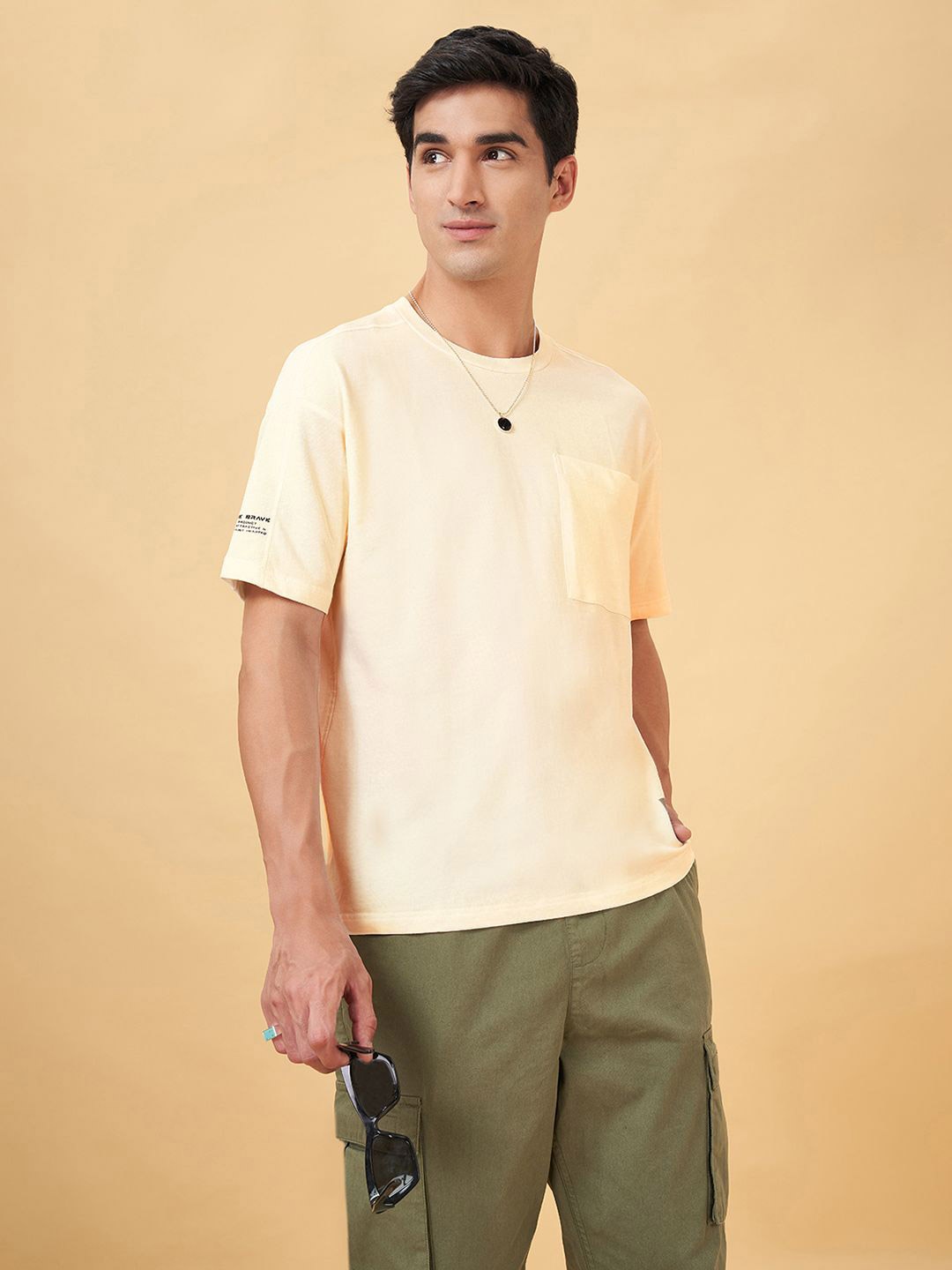 Street 808 by Pantaloons Men Solid Drop shoulder Sleeves Round Neck Pocket T-shirt, Yellow
Street 808 by Pantaloons Men Solid Drop shoulder Sleeves Round Neck Pocket T-shirt, Yellow