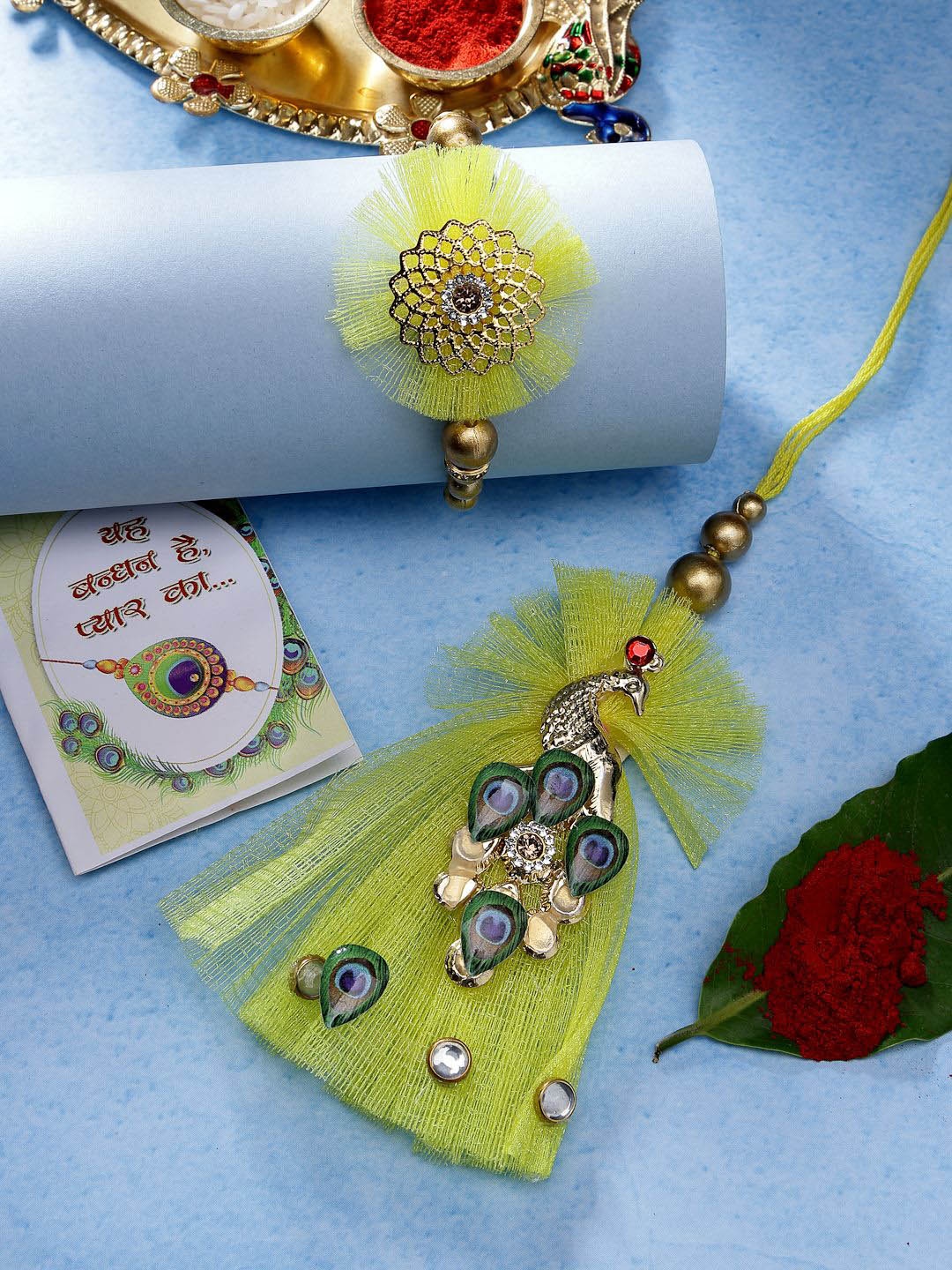 NVR Set of 2 Peacock Design Rakhis With Chocolate & Greeting Card with Roli Chawal, Yellow
NVR Set of 2 Peacock Design Rakhis With Chocolate & Greeting Card with Roli Chawal, Yellow