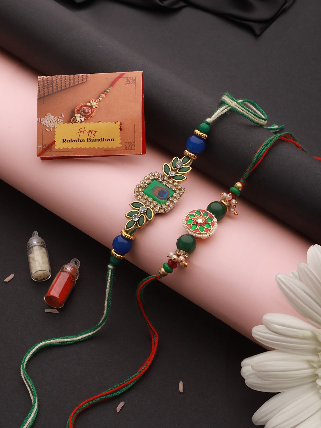 Saraf RS Jewellery Set Of 2 Kundan Meenakari Rakhi With Roli Chawal & Greeting Card, Gold
Saraf RS Jewellery Set Of 2 Kundan Meenakari Rakhi With Roli Chawal & Greeting Card, Gold