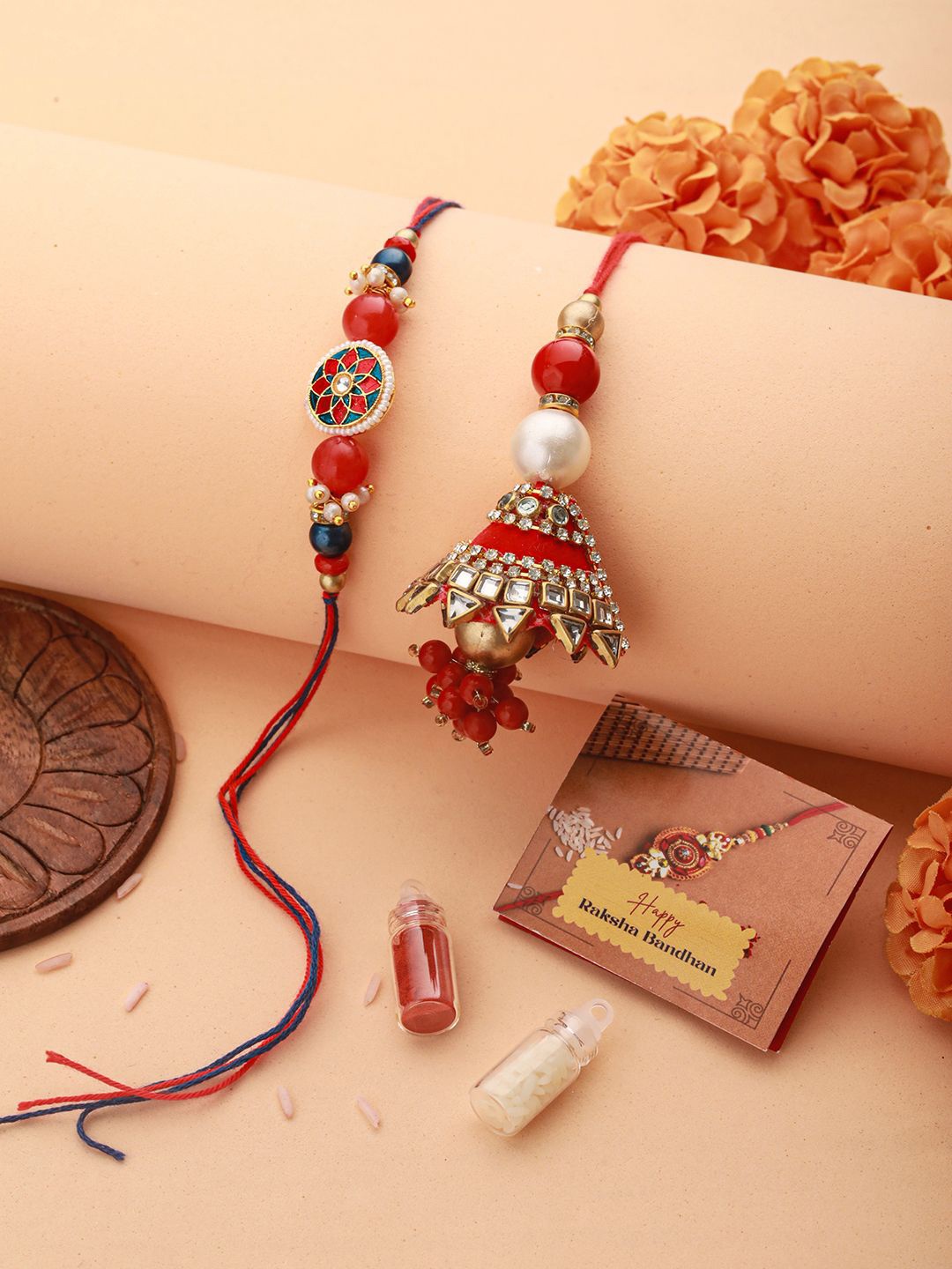 Saraf RS Jewellery Set of 2 Kundan & pearl Lumba Rakhis with Roli Chawal & Greeting Card, Red
Saraf RS Jewellery Set of 2 Kundan & pearl Lumba Rakhis with Roli Chawal & Greeting Card, Red