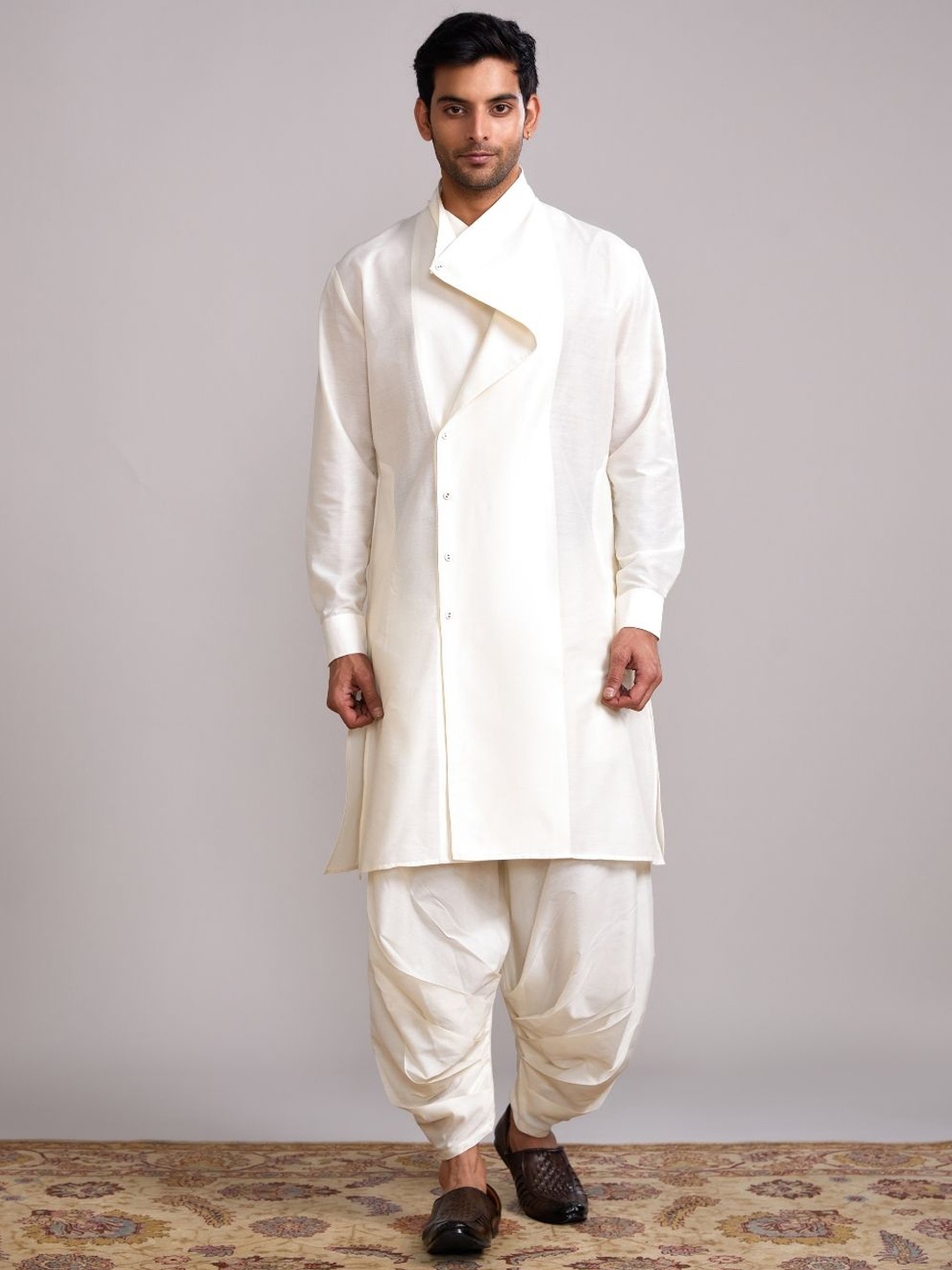 Abhishti Draped Neck Long Sleeves Knee Length Straight Kurta with Dhoti Pants, Cream
Abhishti Draped Neck Long Sleeves Knee Length Straight Kurta with Dhoti Pants, Cream