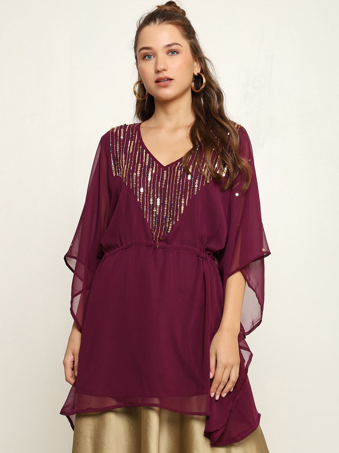 CRAFTBAZAR Embellished V-Neck Flared Sleeves Gotta Patti Gotta Patti Kaftan Kurti, Burgundy
CRAFTBAZAR Embellished V-Neck Flared Sleeves Gotta Patti Gotta Patti Kaftan Kurti, Burgundy