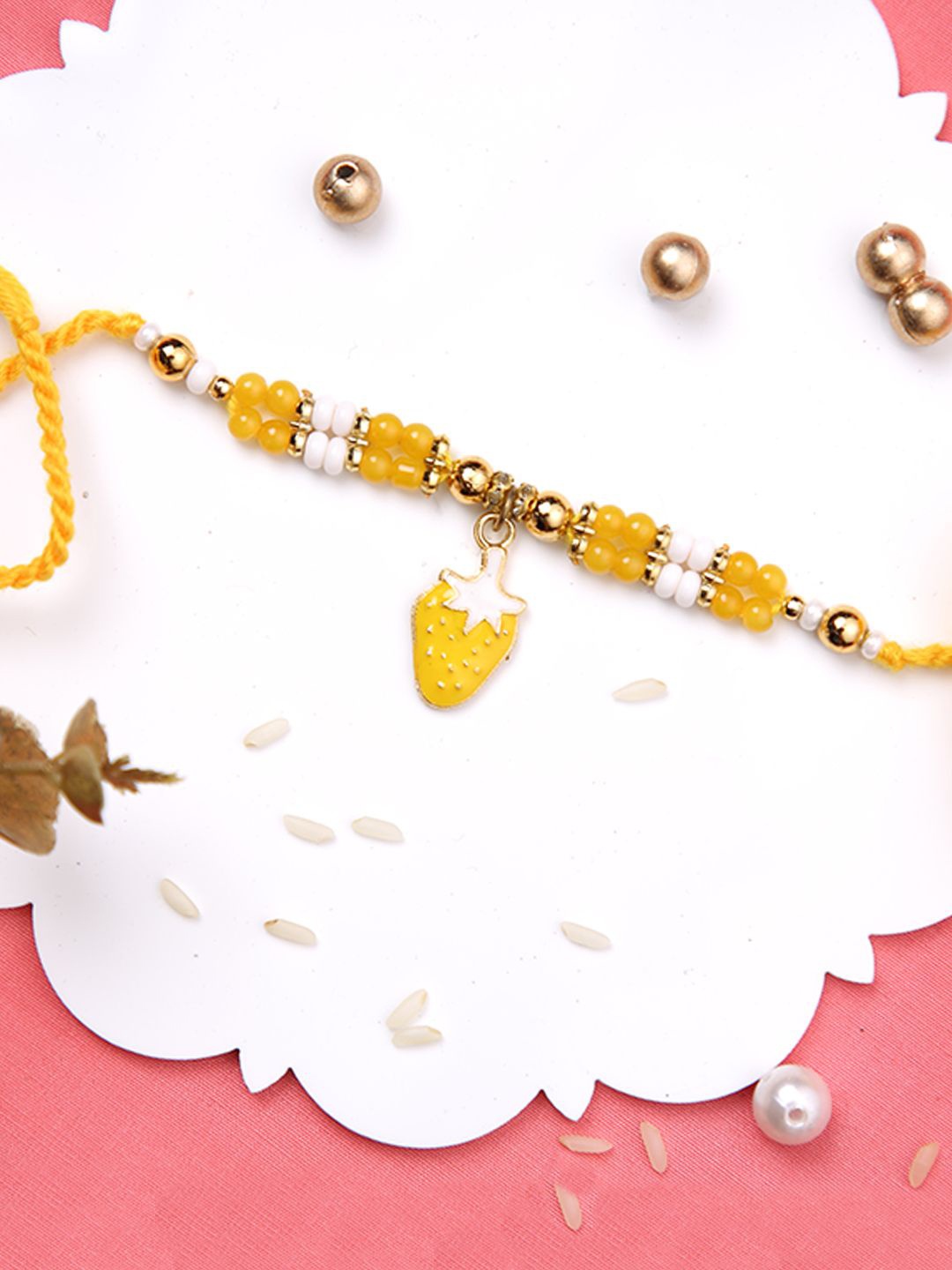 Aapno Rajasthan Strawberry Beaded Multistrand Rakhi With Roli Chawal & Greetings Card, Yellow
Aapno Rajasthan Strawberry Beaded Multistrand Rakhi With Roli Chawal & Greetings Card, Yellow