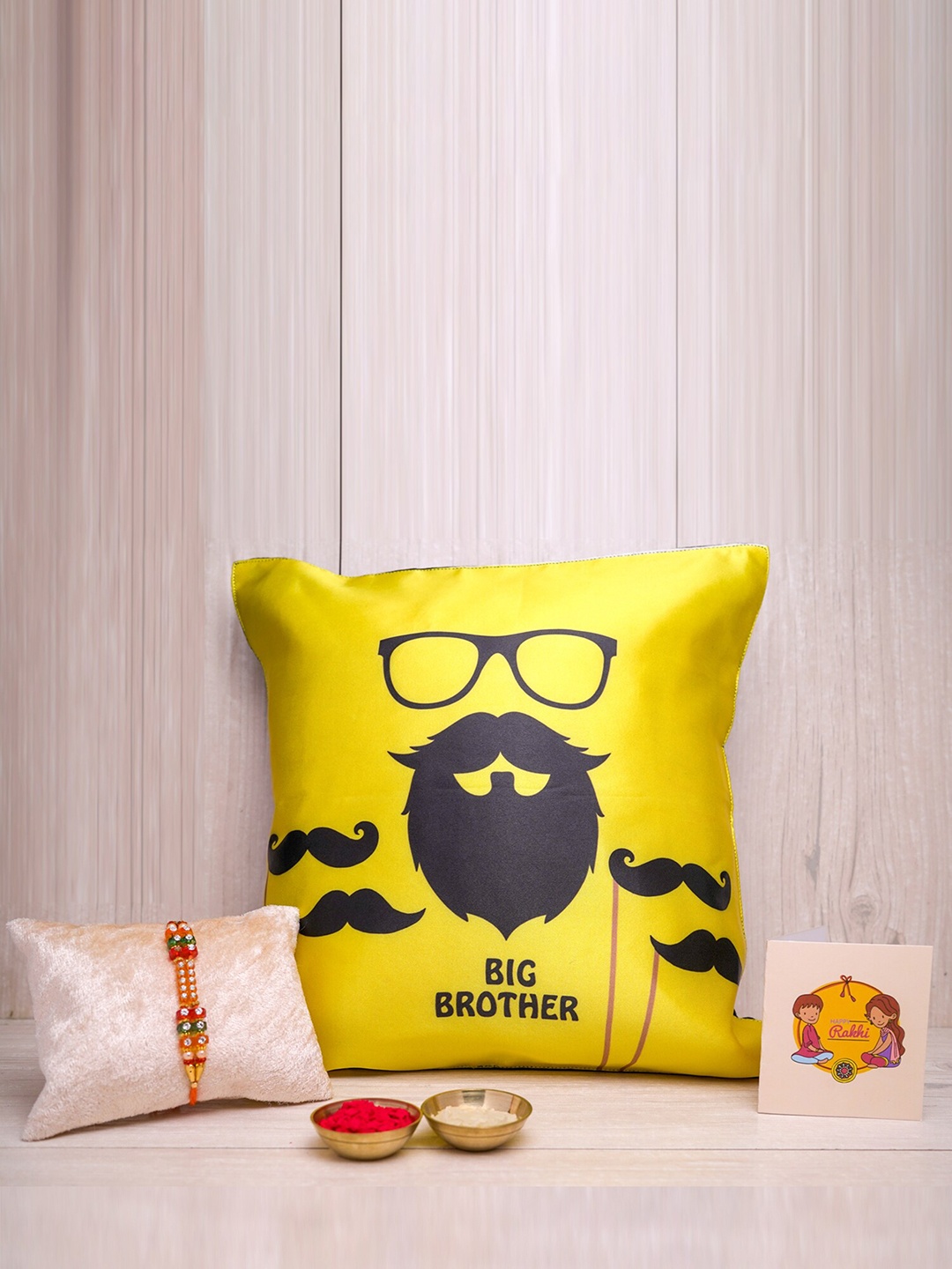 Phirki Studio Set Of 2 Beaded Rakhi With Cushion, Greeting Card & Roli Chawal, Yellow
Phirki Studio Set Of 2 Beaded Rakhi With Cushion, Greeting Card & Roli Chawal, Yellow