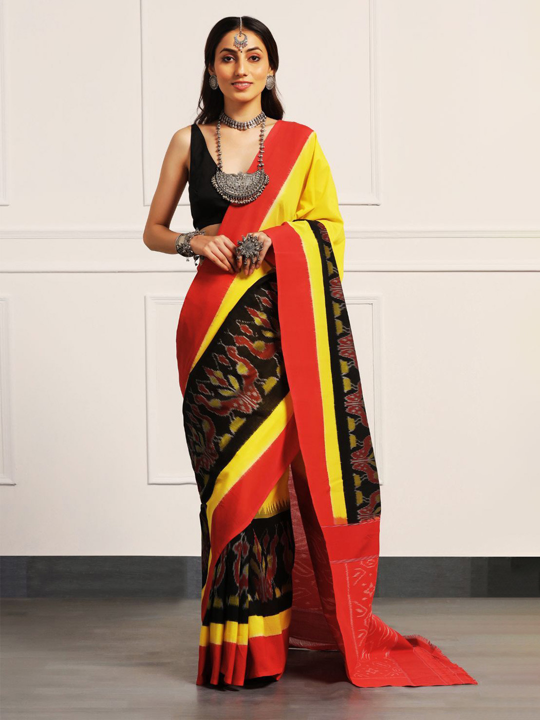 ADITRI Handloom Pure Cotton Handloom Ikat Saree, Black 
ADITRI Handloom Pure Cotton Handloom Ikat Saree, Black