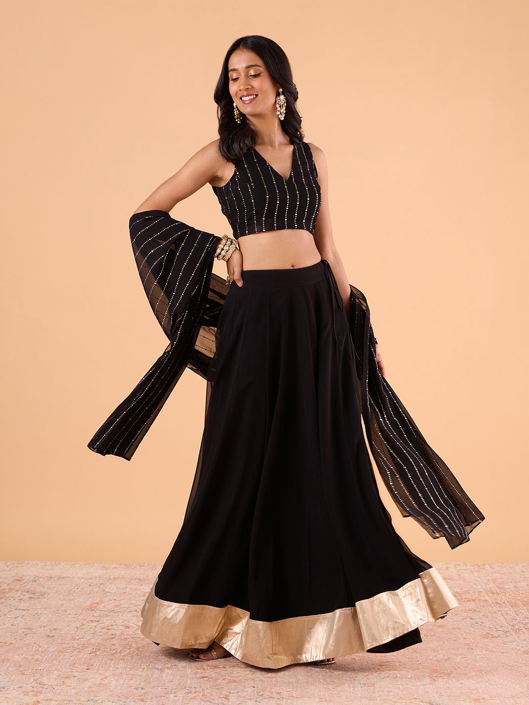Gajra Gang Embellished Sequinned Foil Print Ready to Wear Lehenga & Blouse With Dupatta, Black
Gajra Gang Embellished Sequinned Foil Print Ready to Wear Lehenga & Blouse With Dupatta, Black