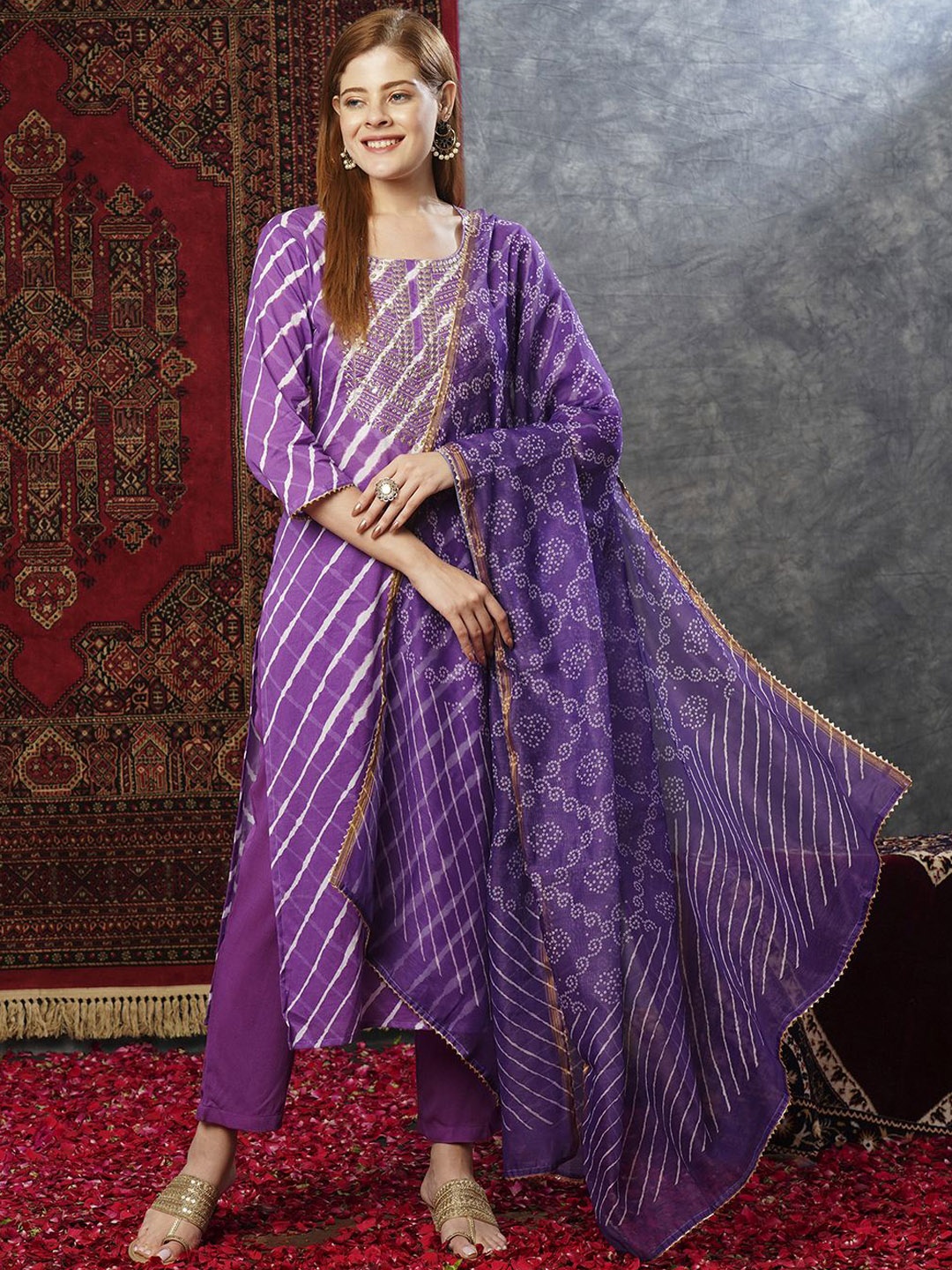 KALINI Leheriya Printed Regular Thread Work Kurta with Trousers & With Dupatta, Purple
KALINI Leheriya Printed Regular Thread Work Kurta with Trousers & With Dupatta, Purple