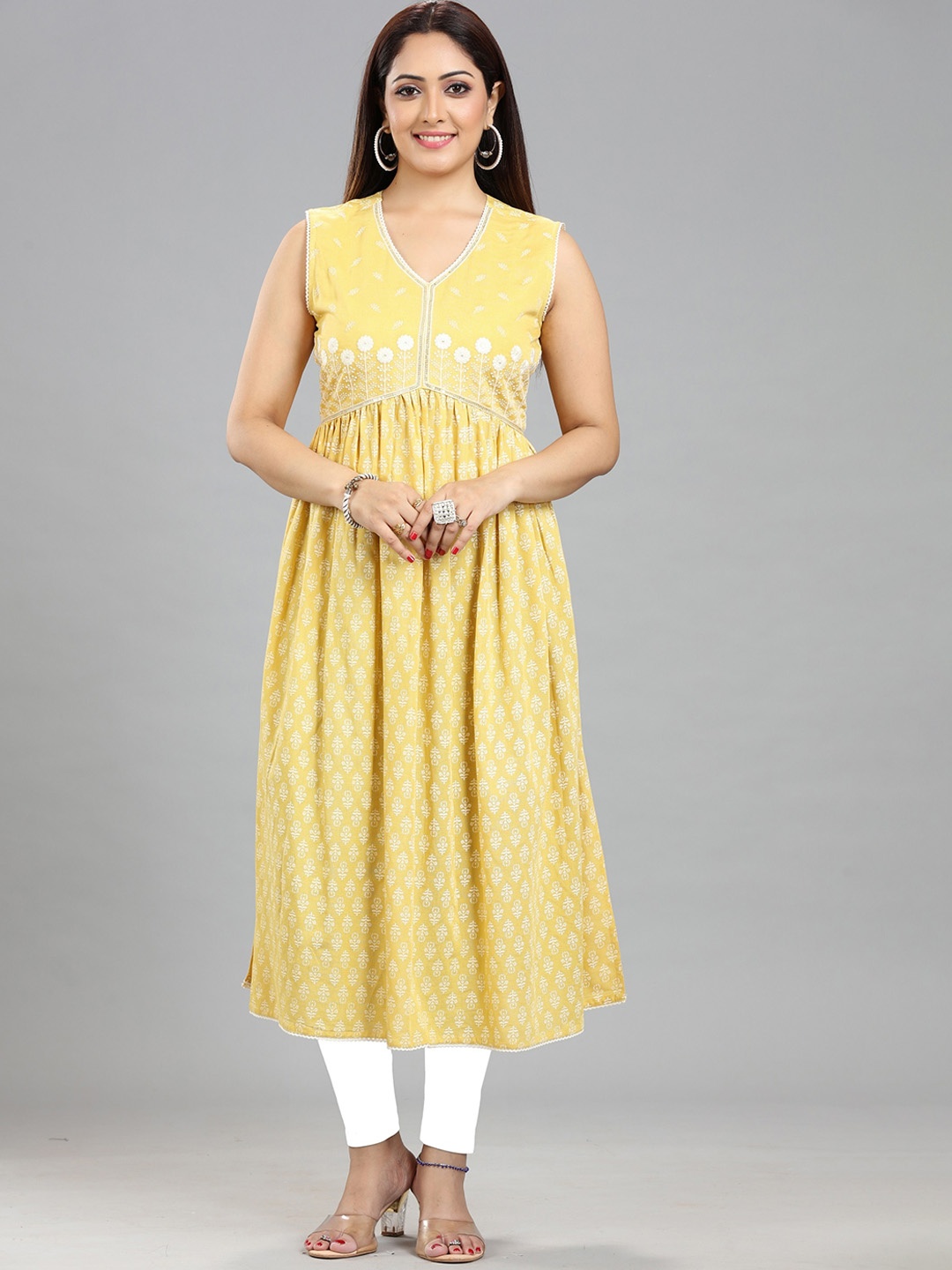 COTTON CULTURE Ethnic Motifs Printed Thread Work Sleeveless Cotton Empire Anarkali Kurta, Yellow
COTTON CULTURE Ethnic Motifs Printed Thread Work Sleeveless Cotton Empire Anarkali Kurta, Yellow