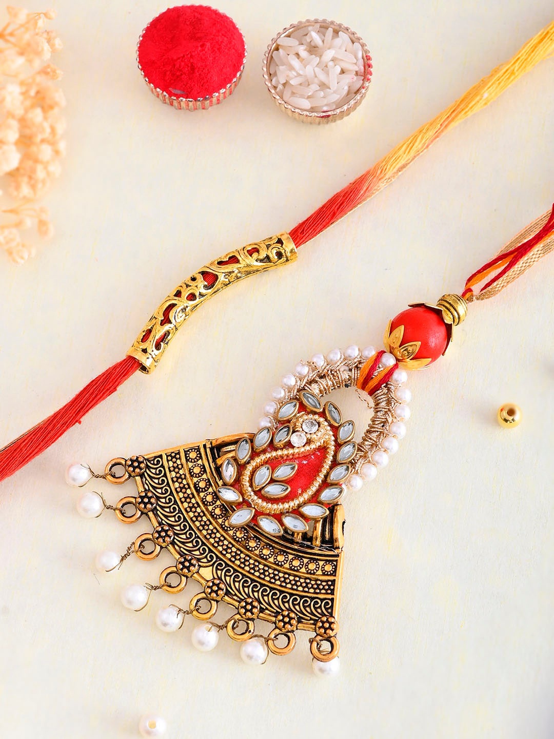 Aapno Rajasthan Bhaiya Bhabhi Beaded Rakhi with Roli Chawal & Greeting Card, Gold
Aapno Rajasthan Bhaiya Bhabhi Beaded Rakhi with Roli Chawal & Greeting Card, Gold