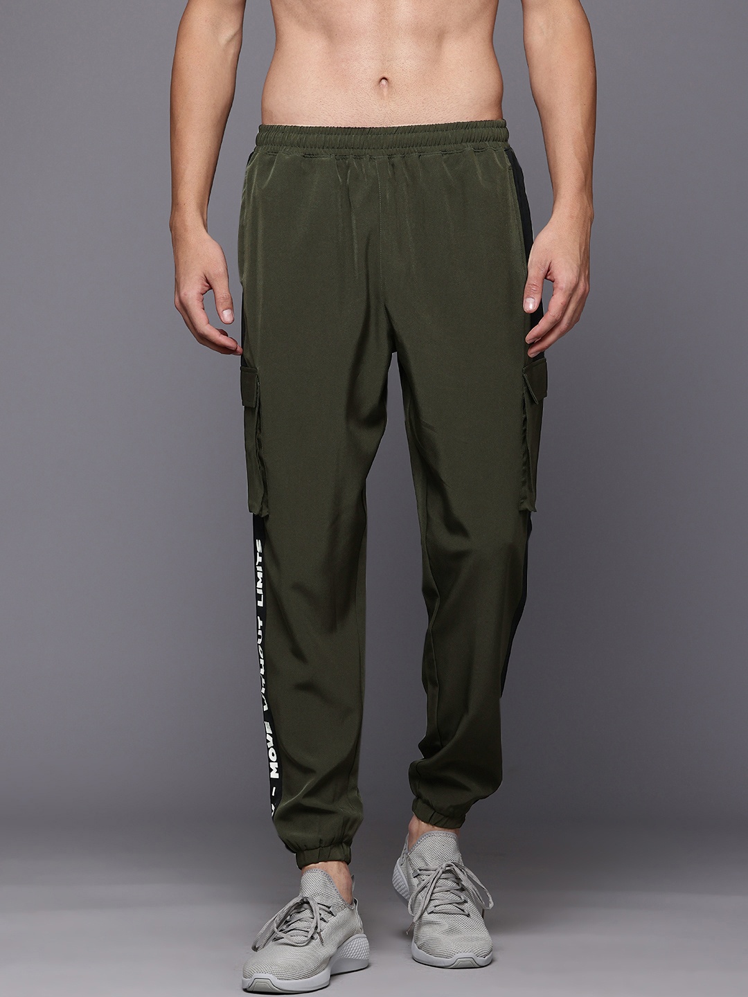 HRX by Hrithik Roshan Men Rapid-Dry Typography Print Training Joggers With Panel Detail, Olive
HRX by Hrithik Roshan Men Rapid-Dry Typography Print Training Joggers With Panel Detail, Olive