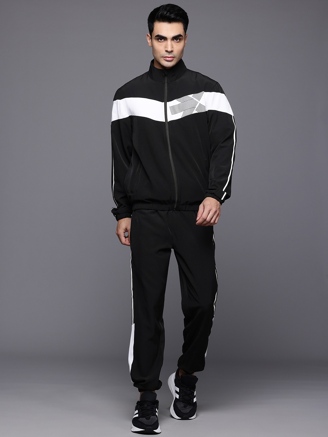 HRX by Hrithik Roshan Colourblocked Brand Logo Printed Rapid-Dry Running Tracksuit, Black
HRX by Hrithik Roshan Colourblocked Brand Logo Printed Rapid-Dry Running Tracksuit, Black