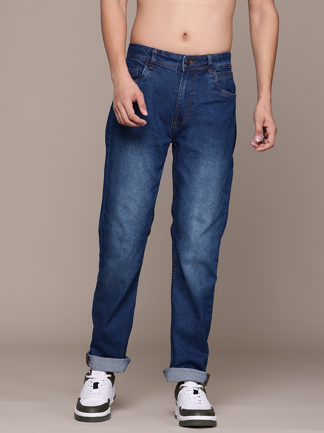 The Roadster Lifestyle Co. Men Regular Fit Mid-Rise Stretchable Jeans, Navy blue
The Roadster Lifestyle Co. Men Regular Fit Mid-Rise Stretchable Jeans, Navy blue