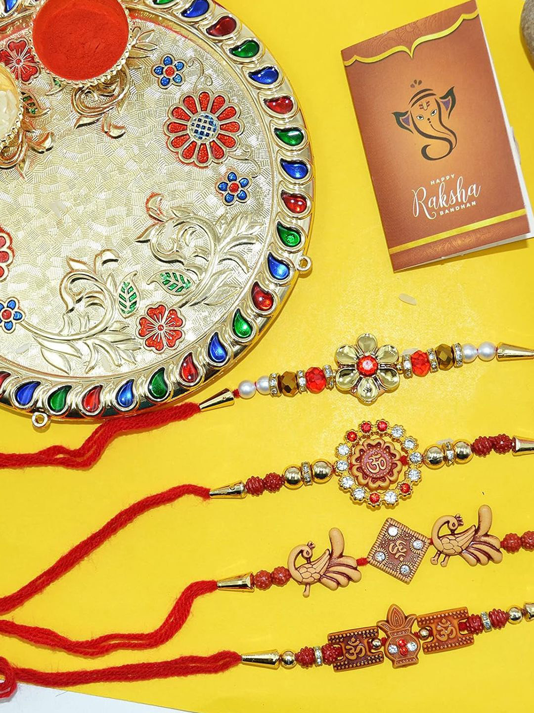 CraftVatika Set Of 7 Rakhi With Pooja Set & Card With Roli Chawal, Gold
CraftVatika Set Of 7 Rakhi With Pooja Set & Card With Roli Chawal, Gold