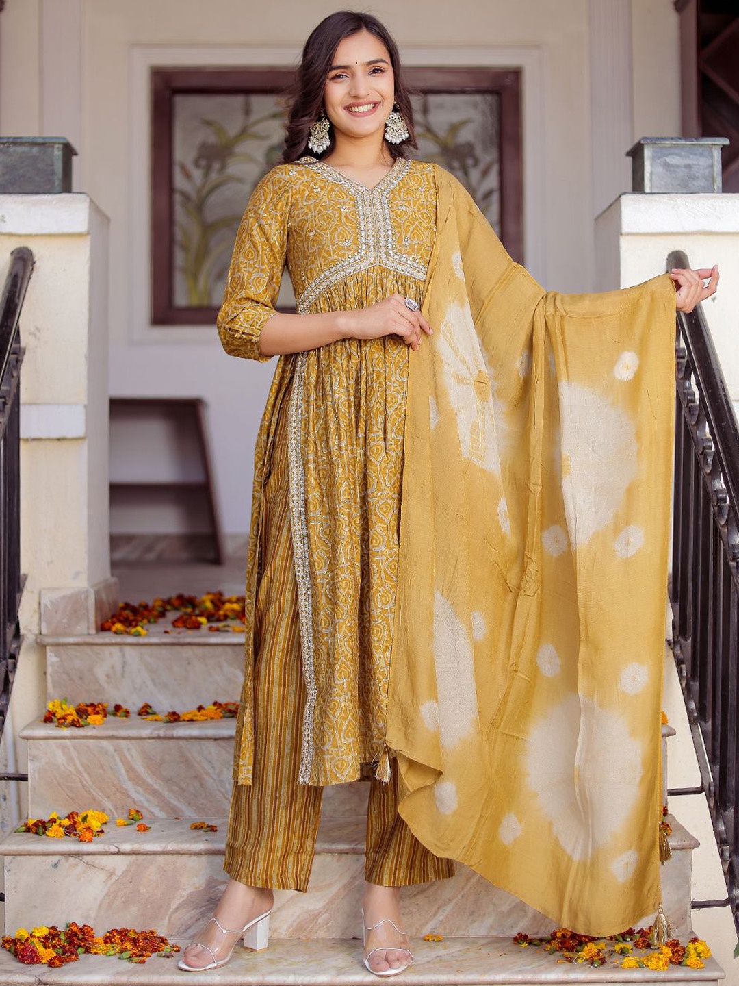 VASVI Women Floral Embroidered Regular Mirror Work Kurta with Trousers & With Dupatta, Yellow
VASVI Women Floral Embroidered Regular Mirror Work Kurta with Trousers & With Dupatta, Yellow