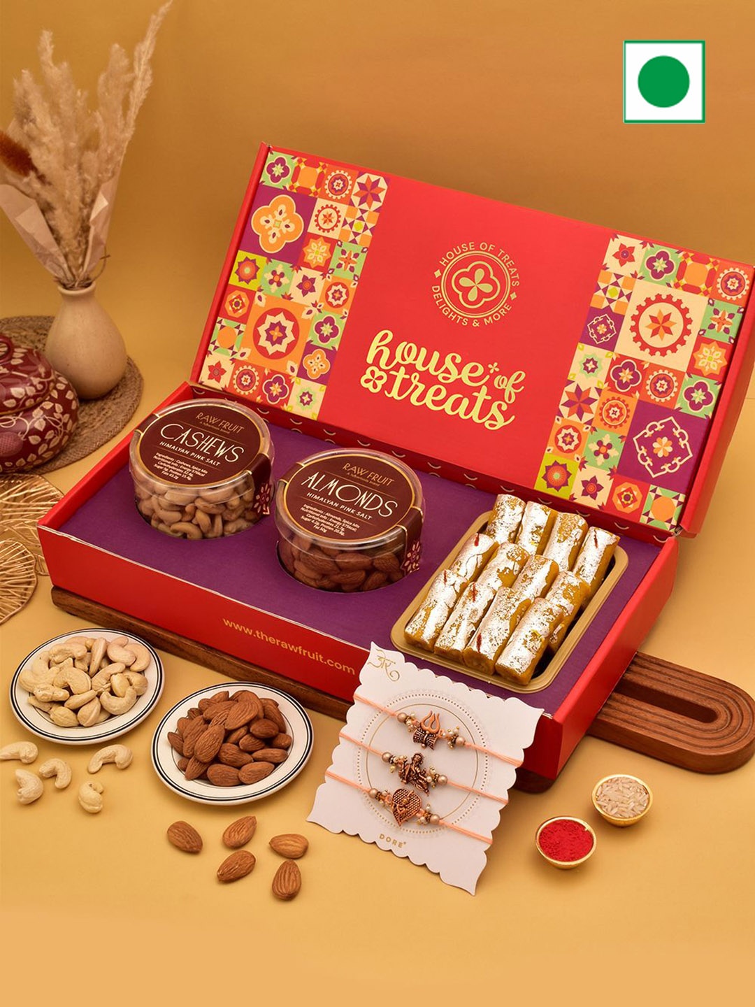 RawFruit Set Of 3 Ganesha & Trishul Charm Rakhis With Roli Chawal Assorted Gifts Set, Cream
RawFruit Set Of 3 Ganesha & Trishul Charm Rakhis With Roli Chawal Assorted Gifts Set, Cream