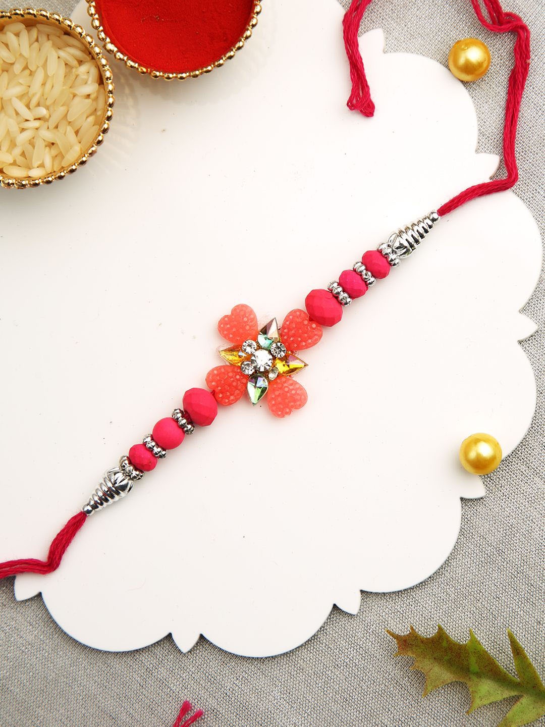 Aapno Rajasthan Beads Studded Floral Shape Rakhi With Roli Chawal & Greetings Card, Blue
Aapno Rajasthan Beads Studded Floral Shape Rakhi With Roli Chawal & Greetings Card, Blue