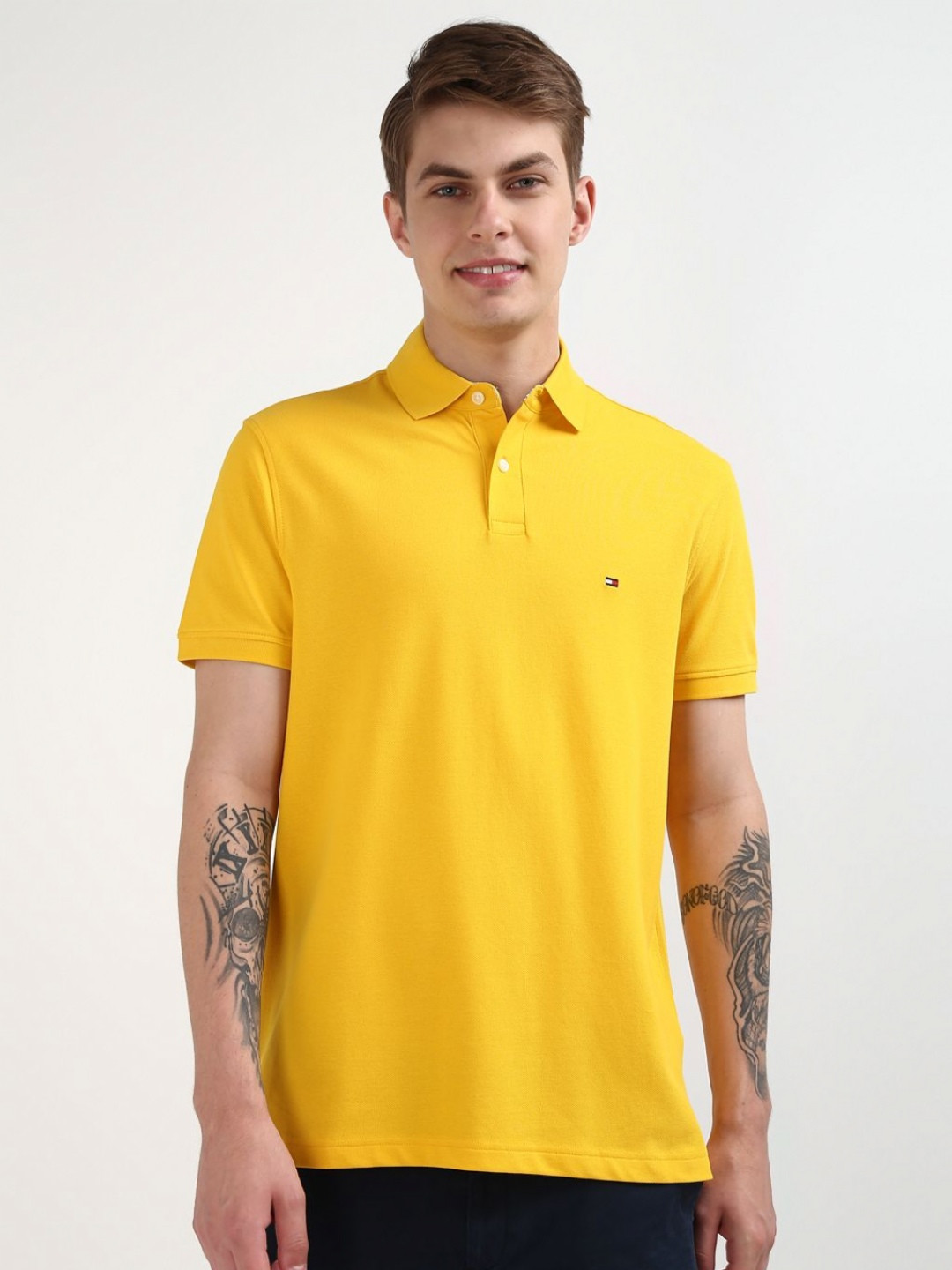 Tommy Hilfiger Men Solid Polo Collar Organic Cotton T-shirt, Yellow 
Tommy Hilfiger Men Solid Polo Collar Organic Cotton T-shirt, Yellow