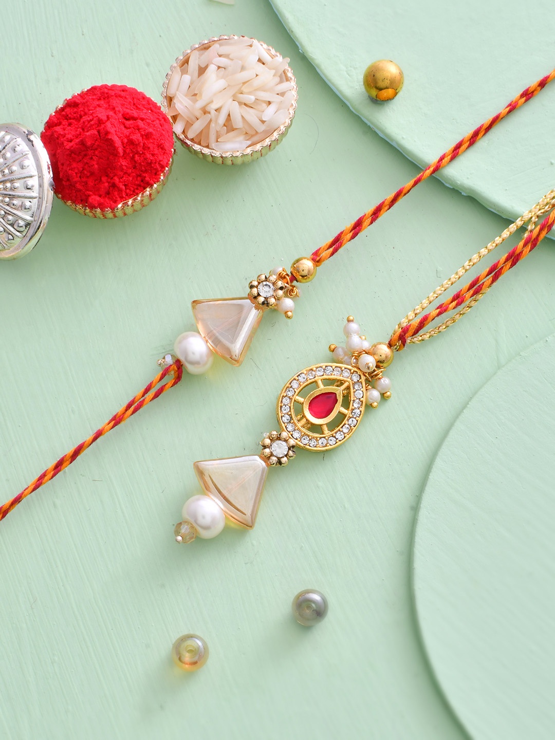 House of Pataudi Set Of 2 Kundan-Studded & Beaded Rakhi With Roli Rice & Greeting Card, Cream
House of Pataudi Set Of 2 Kundan-Studded & Beaded Rakhi With Roli Rice & Greeting Card, Cream