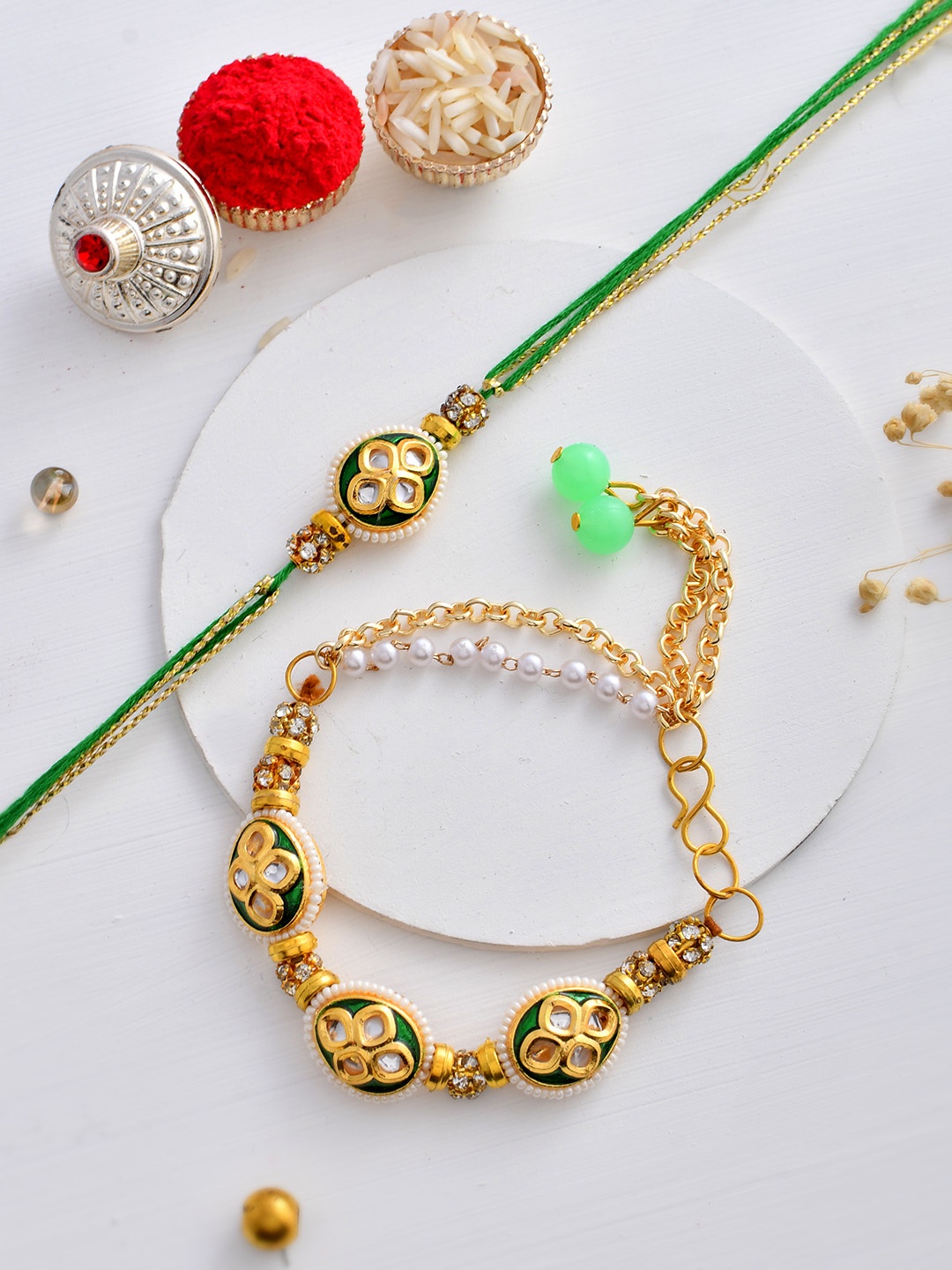 House of Pataudi Set Of 2 Kundan Crafted Emerald Bracelet With Bhaiya Rakhi Gift Set, Gold
House of Pataudi Set Of 2 Kundan Crafted Emerald Bracelet With Bhaiya Rakhi Gift Set, Gold