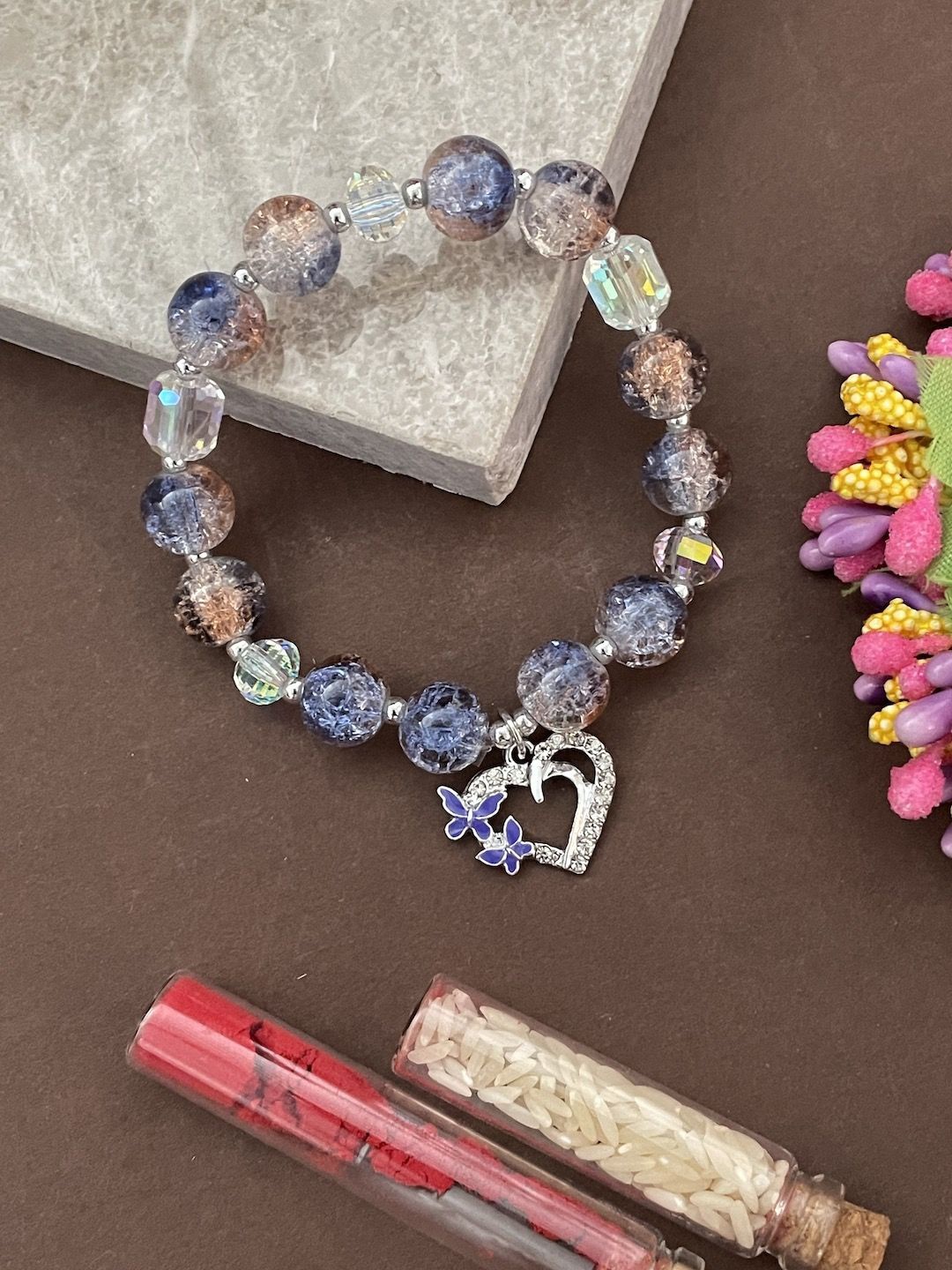 Digital Dress Room American Diamond Heart Charm Beaded Bracelete Rakhi With Roli Chawal, Grey
Digital Dress Room American Diamond Heart Charm Beaded Bracelete Rakhi With Roli Chawal, Grey