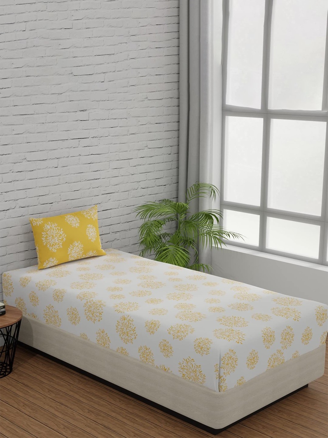 Huesland White & Yellow Floral Printed 144 TC Cotton Single Bedsheet with 1 Pillow Cover
Huesland White & Yellow Floral Printed 144 TC Cotton Single Bedsheet with 1 Pillow Cover