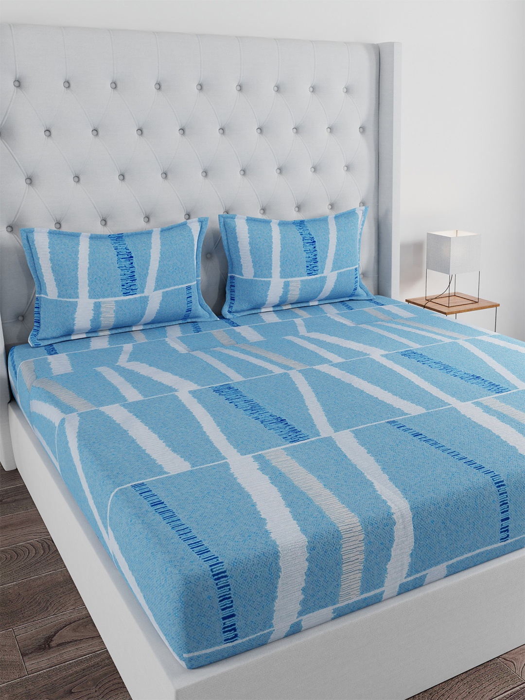 Huesland White & Blue Graphic Cotton 144 TC Double Queen Bedsheet With 2 Pillow Covers
Huesland White & Blue Graphic Cotton 144 TC Double Queen Bedsheet With 2 Pillow Covers