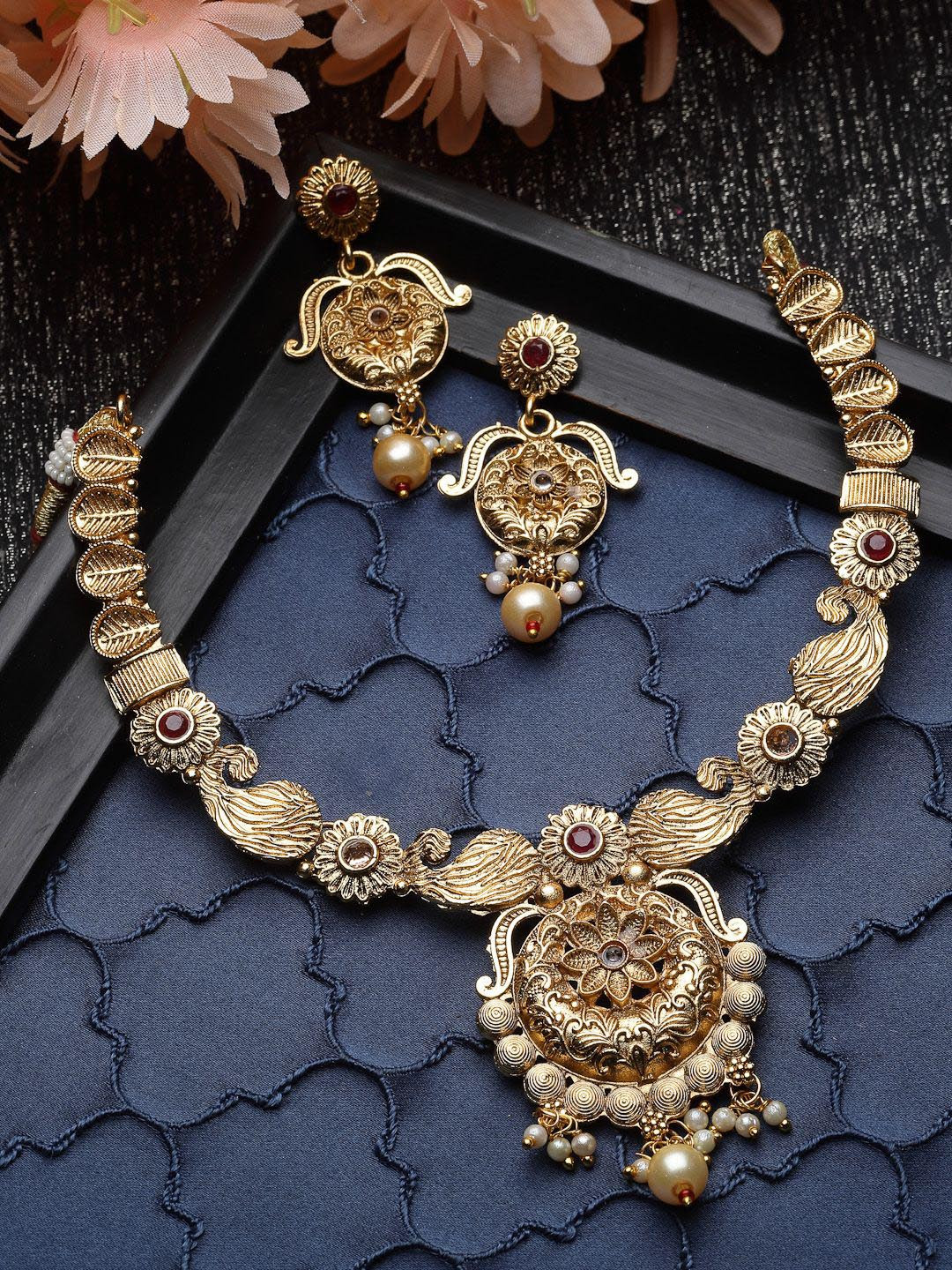 Sukkhi Gold Plated Stone Studded & Beaded Jewellery Set
Sukkhi Gold Plated Stone Studded & Beaded Jewellery Set
