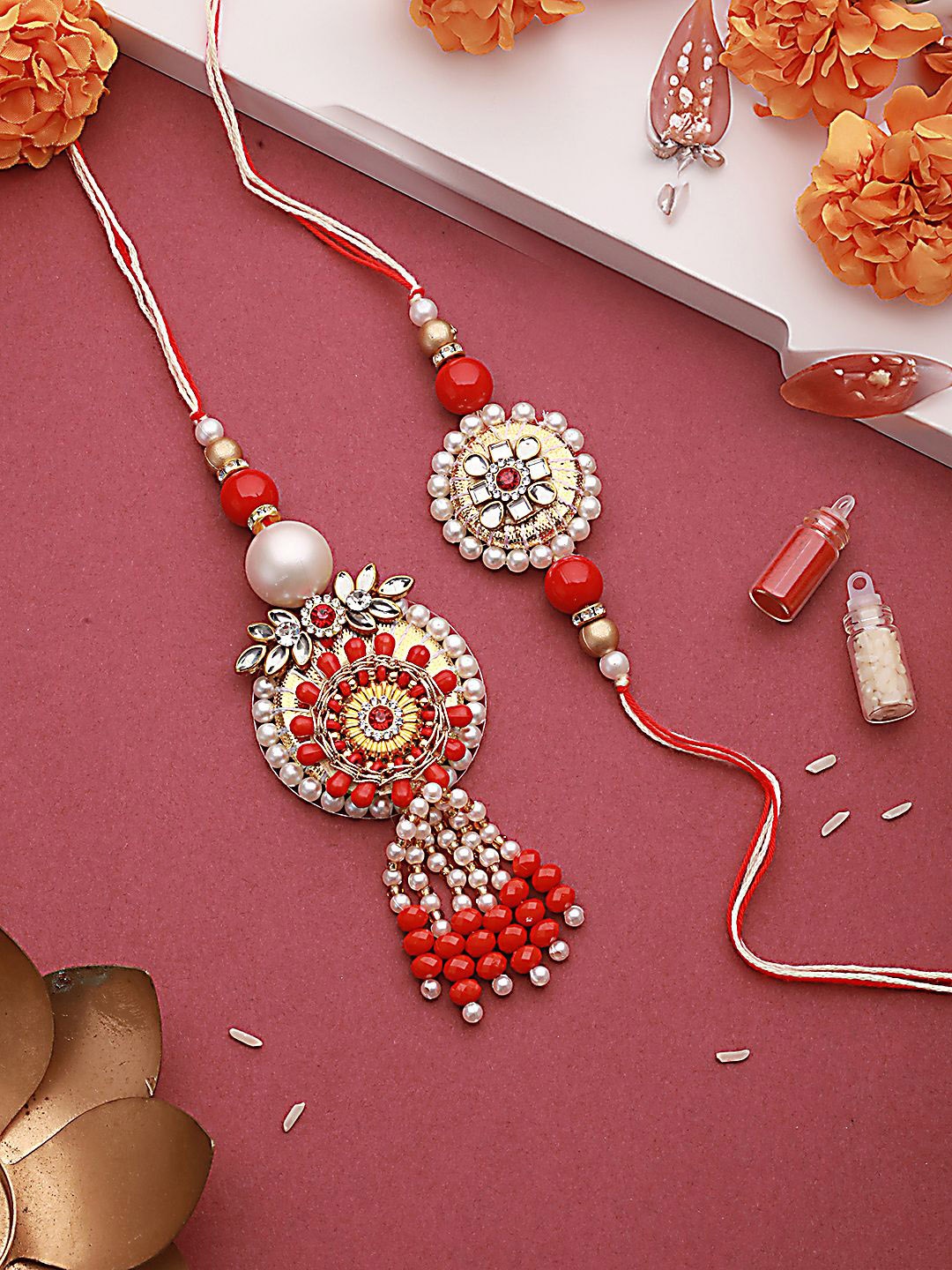 Jazz and Sizzle Round Shaped Kundan & Stone Studded Bhaiya Bhabhi Rakhi With Roli & Chawal, Maroon
Jazz and Sizzle Round Shaped Kundan & Stone Studded Bhaiya Bhabhi Rakhi With Roli & Chawal, Maroon