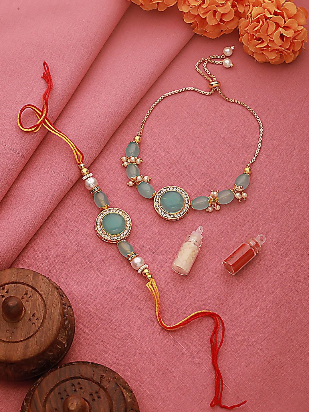 Jazz and Sizzle Stone & CZ Studded Bhaiya Bhabhi Chain Rakhi with Roli & Chawal, Blue
Jazz and Sizzle Stone & CZ Studded Bhaiya Bhabhi Chain Rakhi with Roli & Chawal, Blue