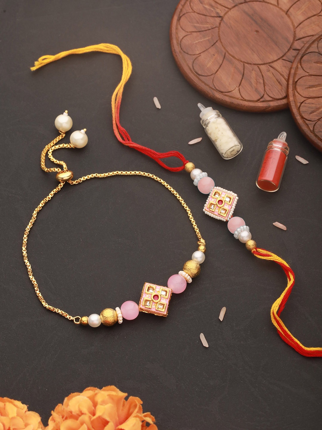Jazz and Sizzle Kundan Studded & Pearl Beaded Bhaiya Bhabhi Chain Rakhi with Roli & Chawal, Pink
Jazz and Sizzle Kundan Studded & Pearl Beaded Bhaiya Bhabhi Chain Rakhi with Roli & Chawal, Pink