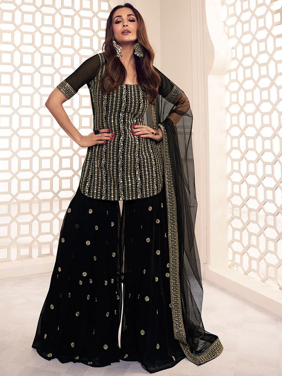 Fashion Basket Ethnic Motifs Embroidered Thread Work A-Line Kurti with Sharara & Dupatta, Black
Fashion Basket Ethnic Motifs Embroidered Thread Work A-Line Kurti with Sharara & Dupatta, Black