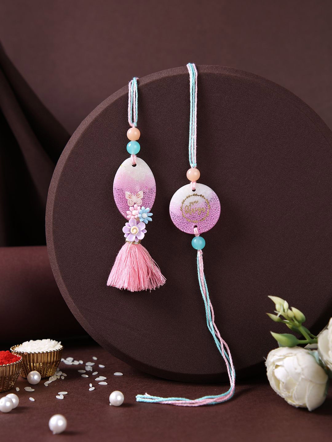 Aapno Rajasthan Resin Work Bhaiya Bhabhi Rakhi With Roli Chawal & Greeting Card, Purple
Aapno Rajasthan Resin Work Bhaiya Bhabhi Rakhi With Roli Chawal & Greeting Card, Purple