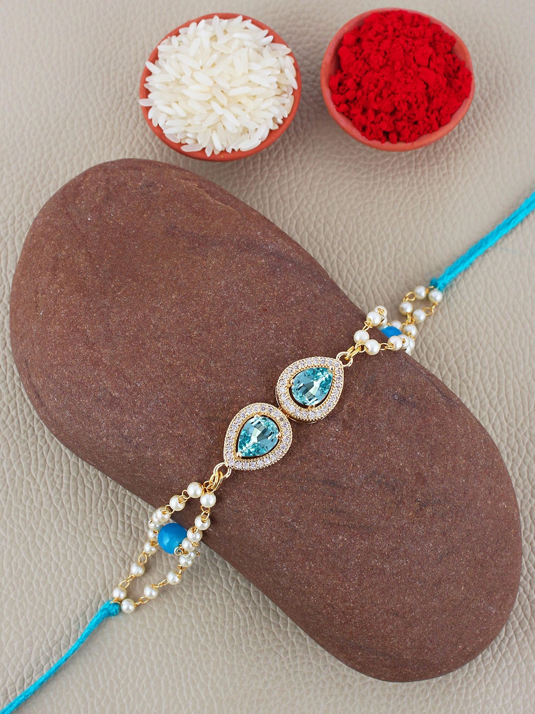 LUCKY JEWELLERY Turquoise Stone-Studded Thread Rakhi With Roli Chawal & Greeting Card, Gold
LUCKY JEWELLERY Turquoise Stone-Studded Thread Rakhi With Roli Chawal & Greeting Card, Gold