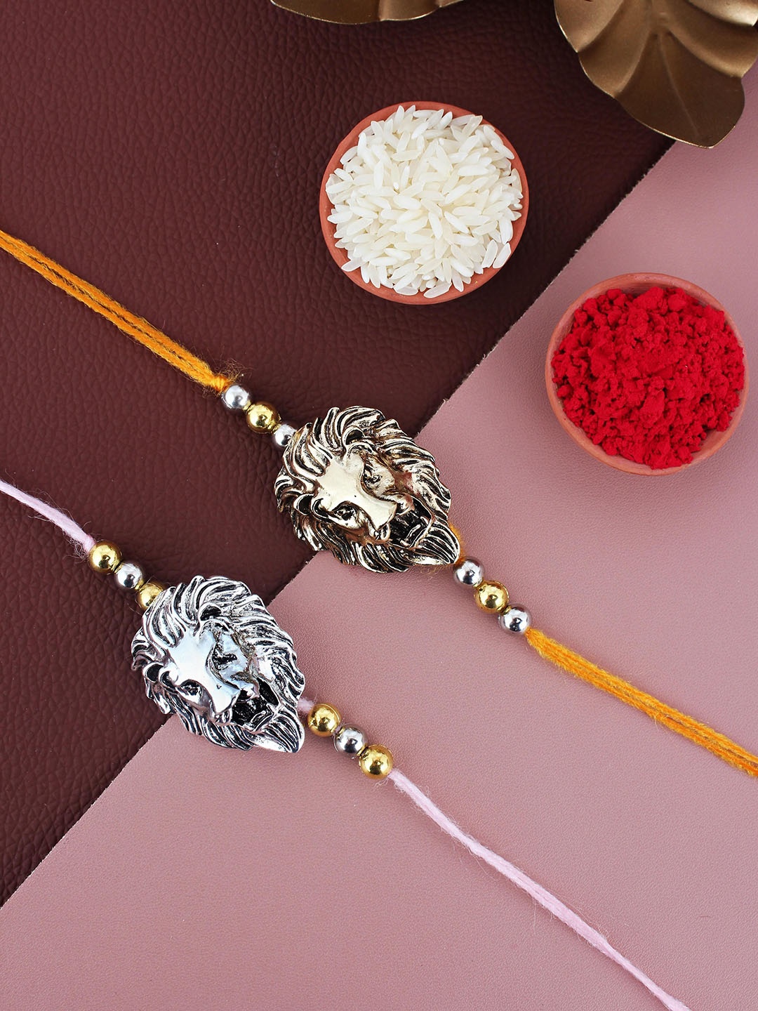 LUCKY JEWELLERY Set Of 2 Oxidised German Silver Rakhis With Roli Chawal & Greeting Card, Pink
LUCKY JEWELLERY Set Of 2 Oxidised German Silver Rakhis With Roli Chawal & Greeting Card, Pink