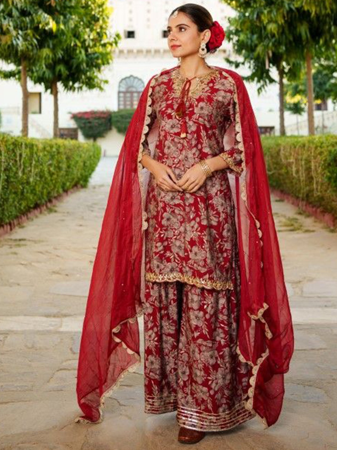 VAASVA JAIPUR Floral Printed Tie-Up Neck Gotta Patti Kurta With Palazzos & Dupatta, Maroon
VAASVA JAIPUR Floral Printed Tie-Up Neck Gotta Patti Kurta With Palazzos & Dupatta, Maroon