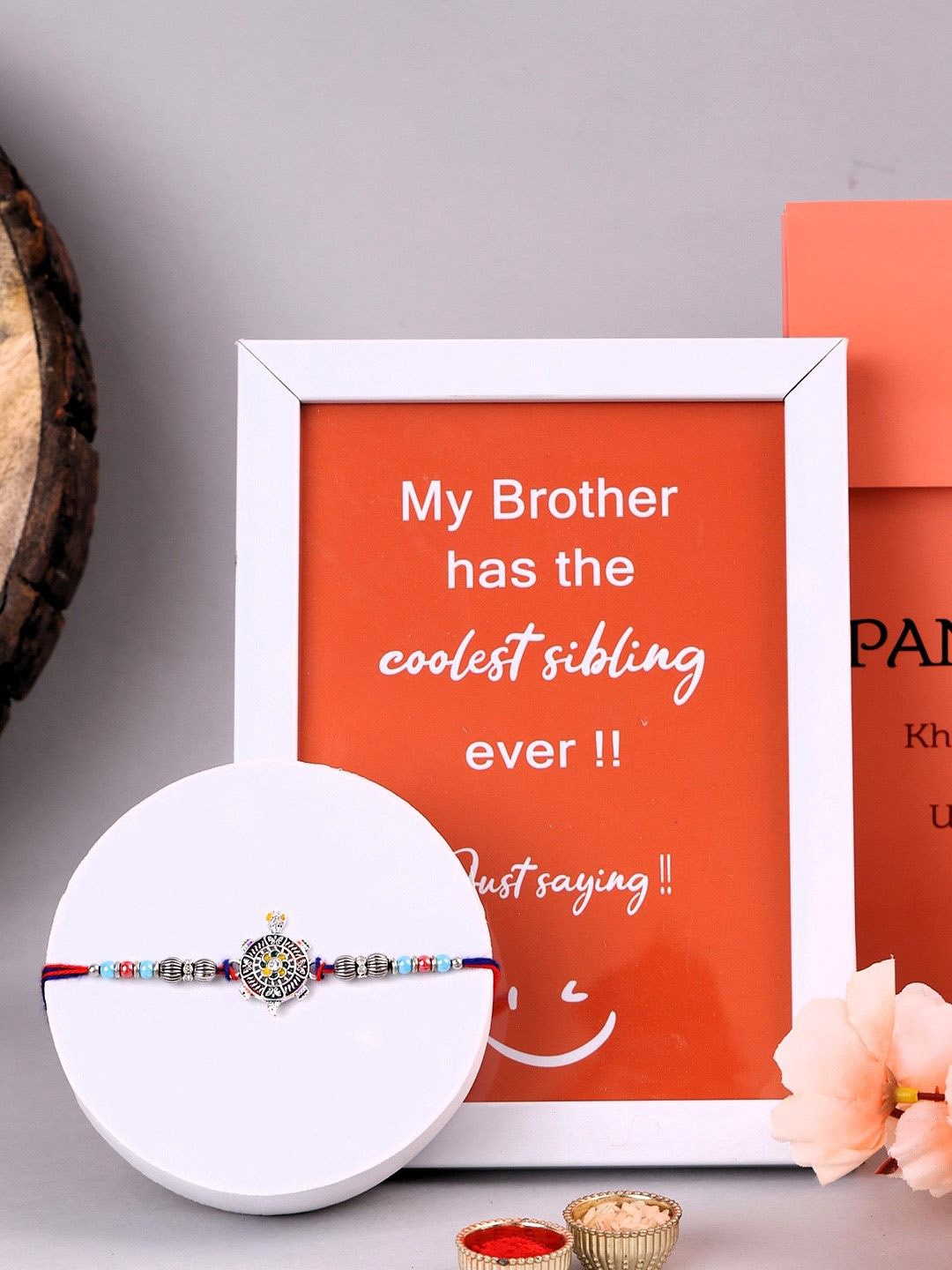 PANASH Set Of 2 Silver-Plated Tortoise Shaped Thread Rakhi With Photo Frame & Roli Chawal, Gold
PANASH Set Of 2 Silver-Plated Tortoise Shaped Thread Rakhi With Photo Frame & Roli Chawal, Gold