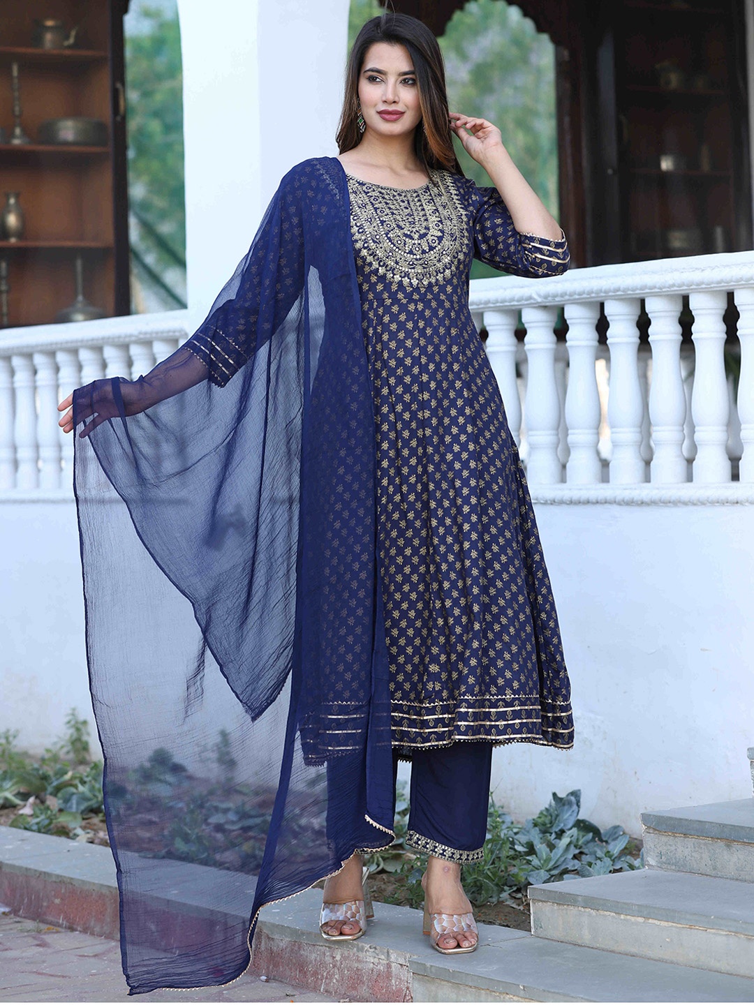SINGNI Ethnic Motifs Printed Regular Sequinned Anarkali Kurta with Trousers & With Dupatta, Blue
SINGNI Ethnic Motifs Printed Regular Sequinned Anarkali Kurta with Trousers & With Dupatta, Blue