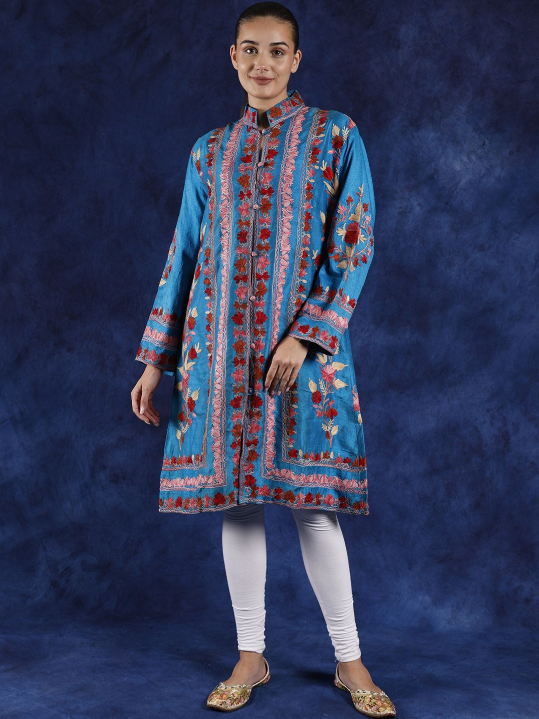 Exotic India Algiers Blue Kashmiri Long Jacket with Aari Embroidered Flowers and Paisleys
Exotic India Algiers Blue Kashmiri Long Jacket with Aari Embroidered Flowers and Paisleys