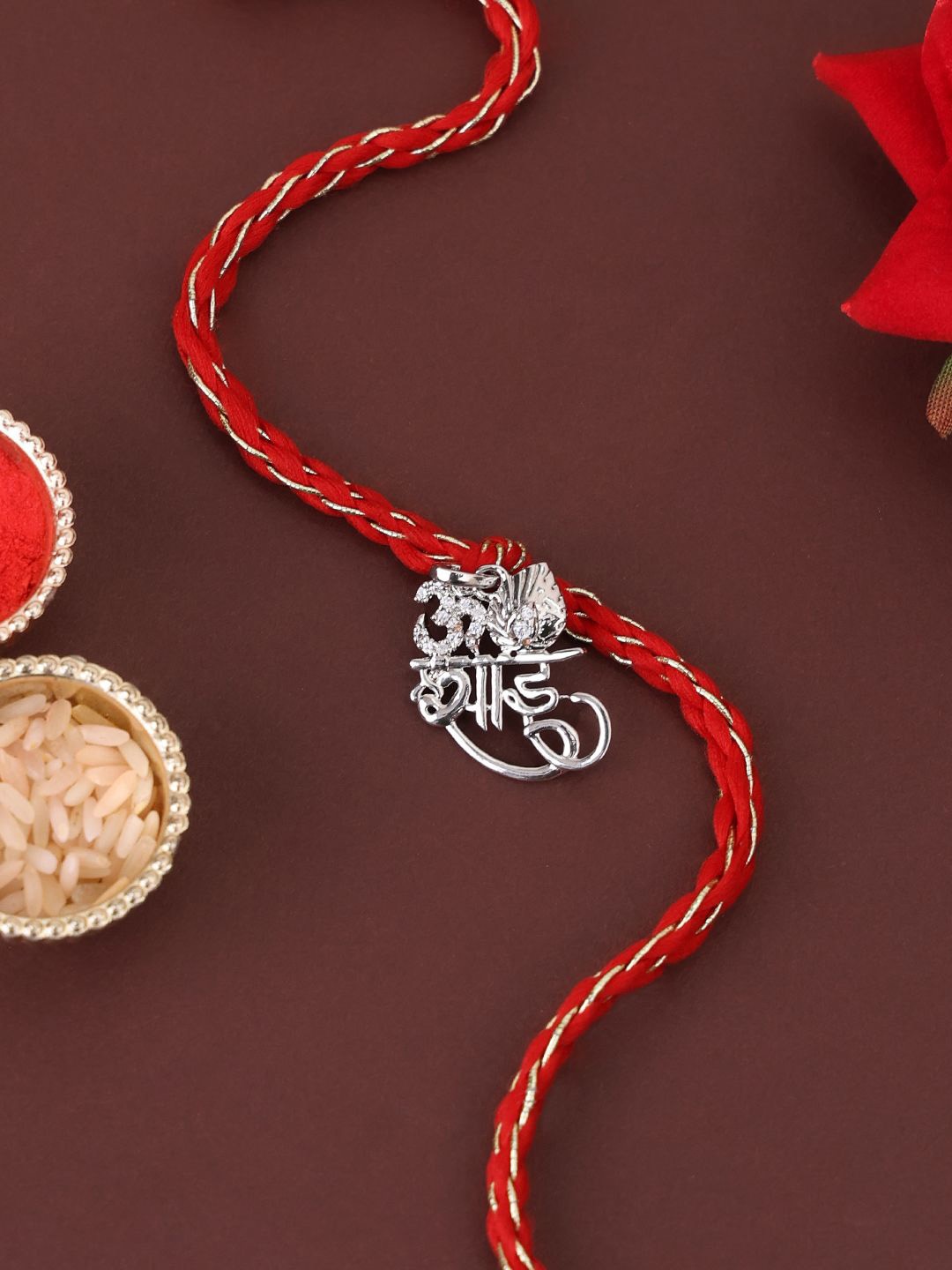 PANASH 925 Sterling Silver -Plated Om Shaped CZ Stone Studded Rakhi With Roli Chawal
PANASH 925 Sterling Silver -Plated Om Shaped CZ Stone Studded Rakhi With Roli Chawal