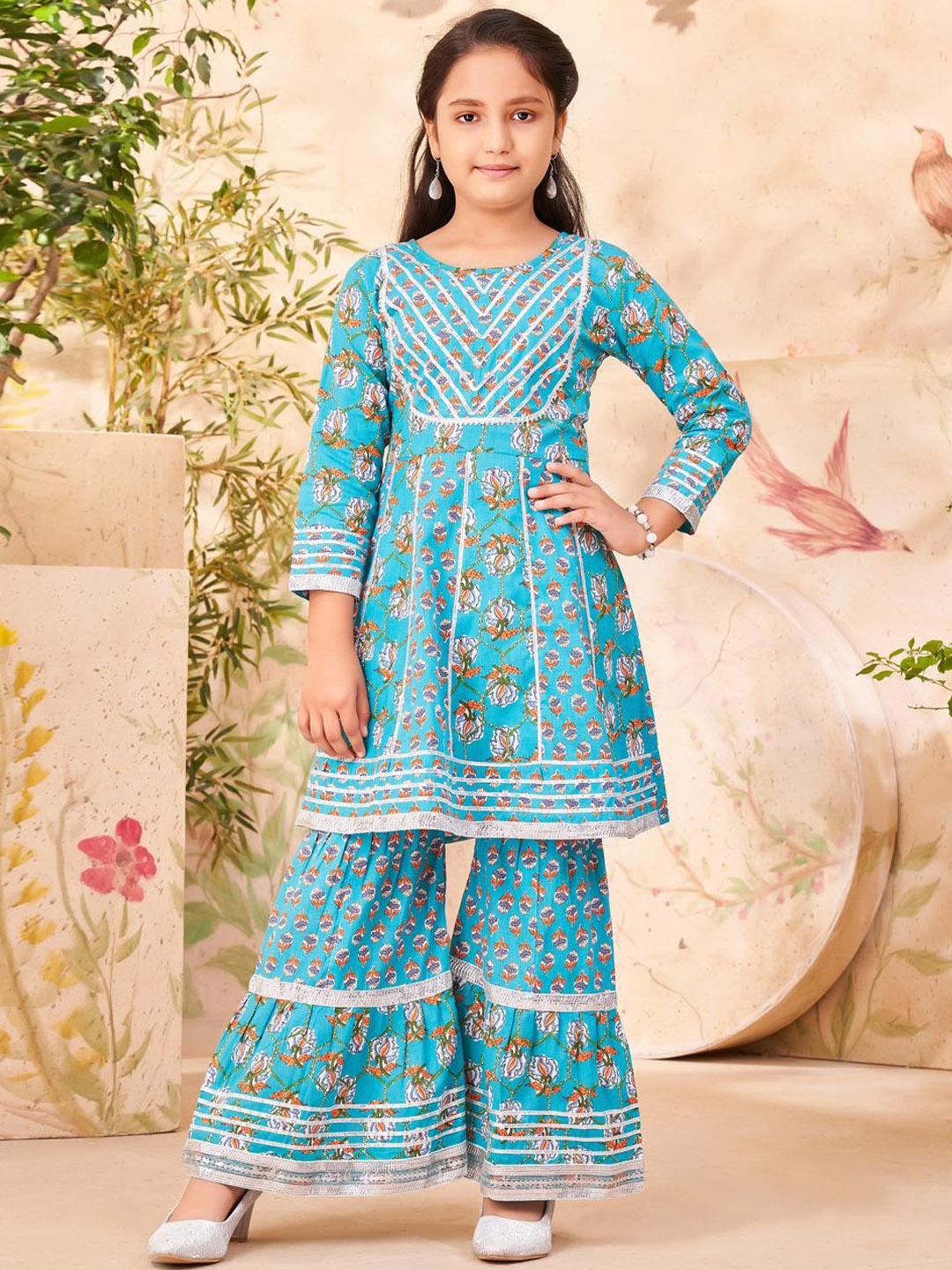 BAESD Girls Floral Printed Pleated Gotta Patti Pure Cotton A-Line Kurta With Sharara, Blue
BAESD Girls Floral Printed Pleated Gotta Patti Pure Cotton A-Line Kurta With Sharara, Blue