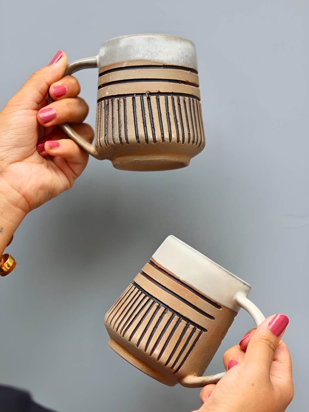 WEAVING HOMES Brown & Black 2 Pieces Textured Matte Finished Ceramic Mugs 290 ml Each
WEAVING HOMES Brown & Black 2 Pieces Textured Matte Finished Ceramic Mugs 290 ml Each