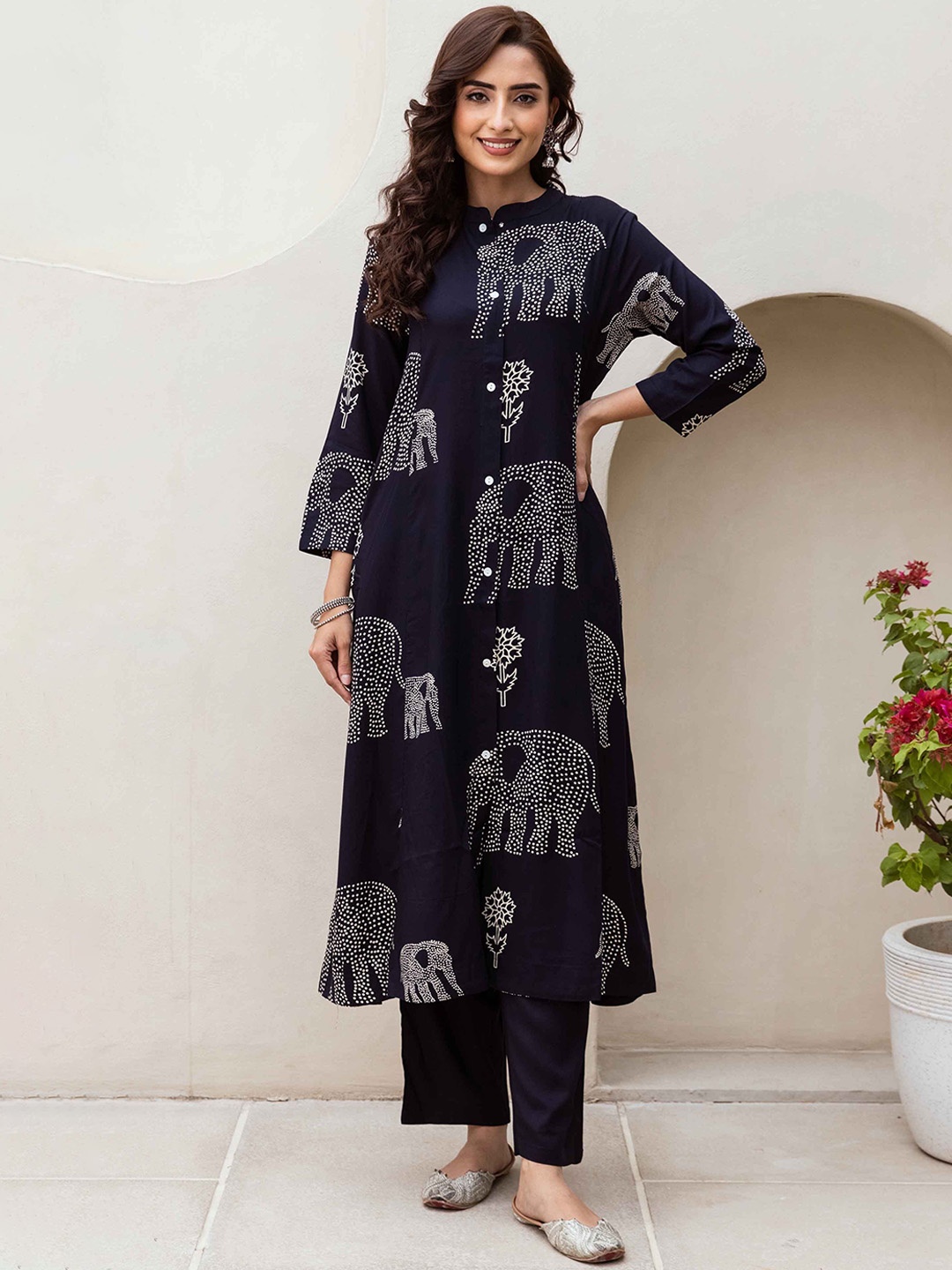 KALINI Conversational Printed Mandarin Collar A-Line Kurta with Trousers, Navy blue
KALINI Conversational Printed Mandarin Collar A-Line Kurta with Trousers, Navy blue